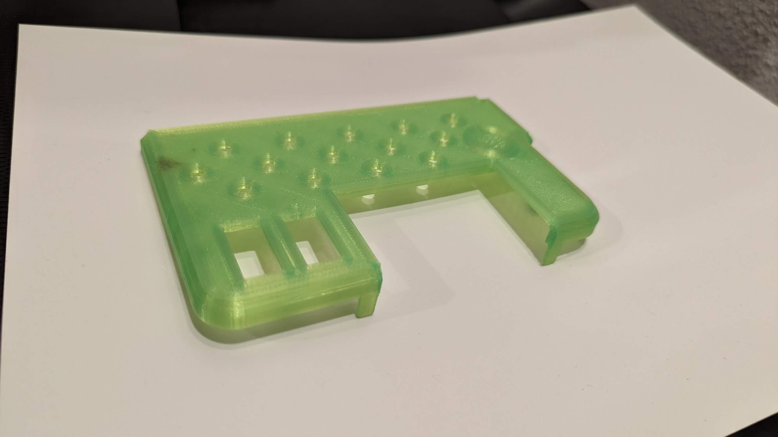 M.2-SATA Top cover right side w separate button for the Framework Laptop Case