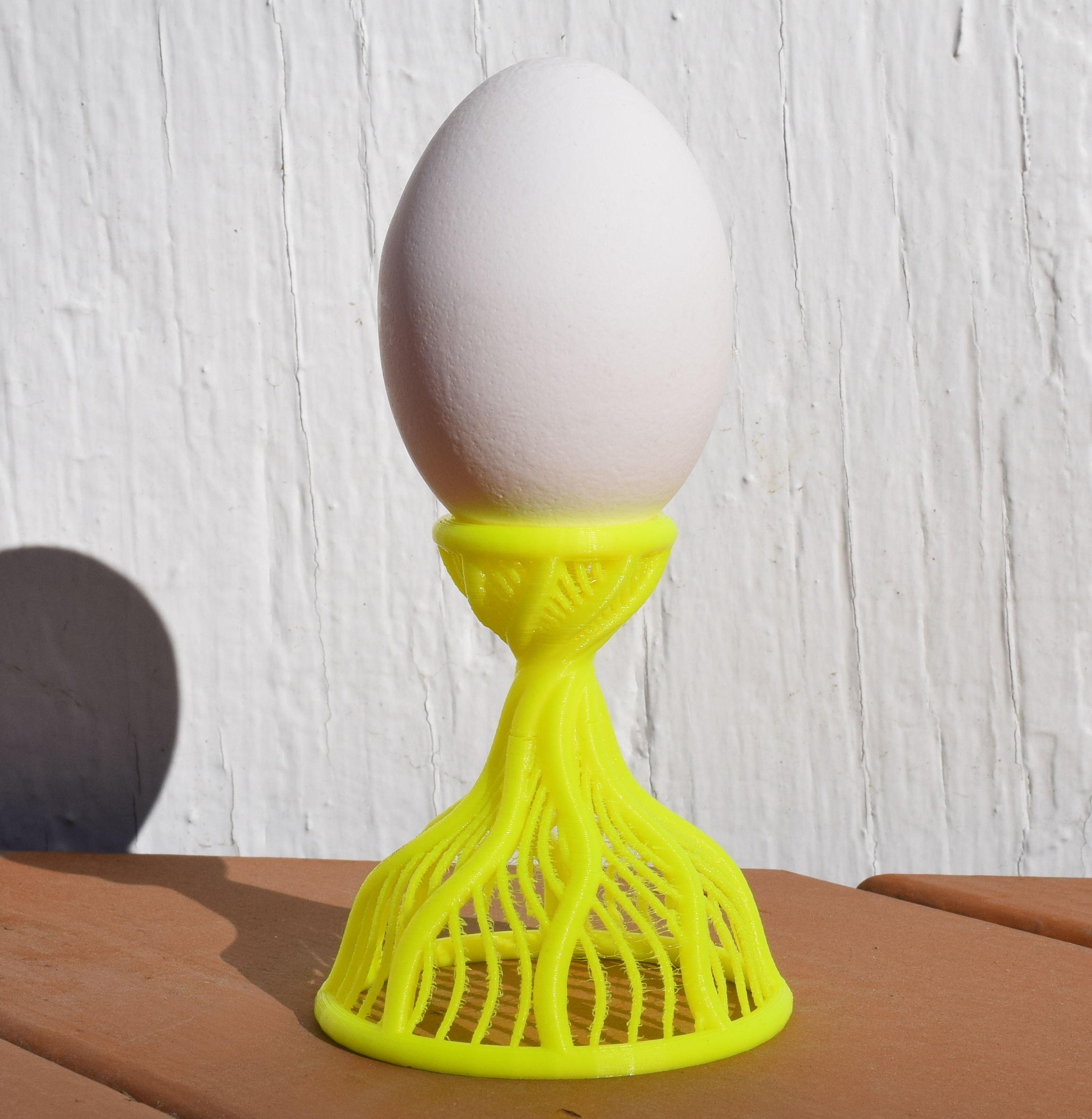 Miniatura 4 do modelo 3D Easter Egg Holder - Group 6 (OpenSCAD)