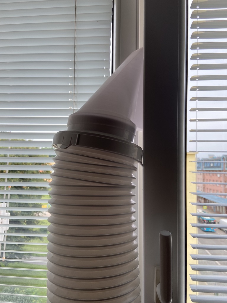 Air conditioner exhaust into the ventilation window by Lubo\u0161 Nov\u00e1k ...
