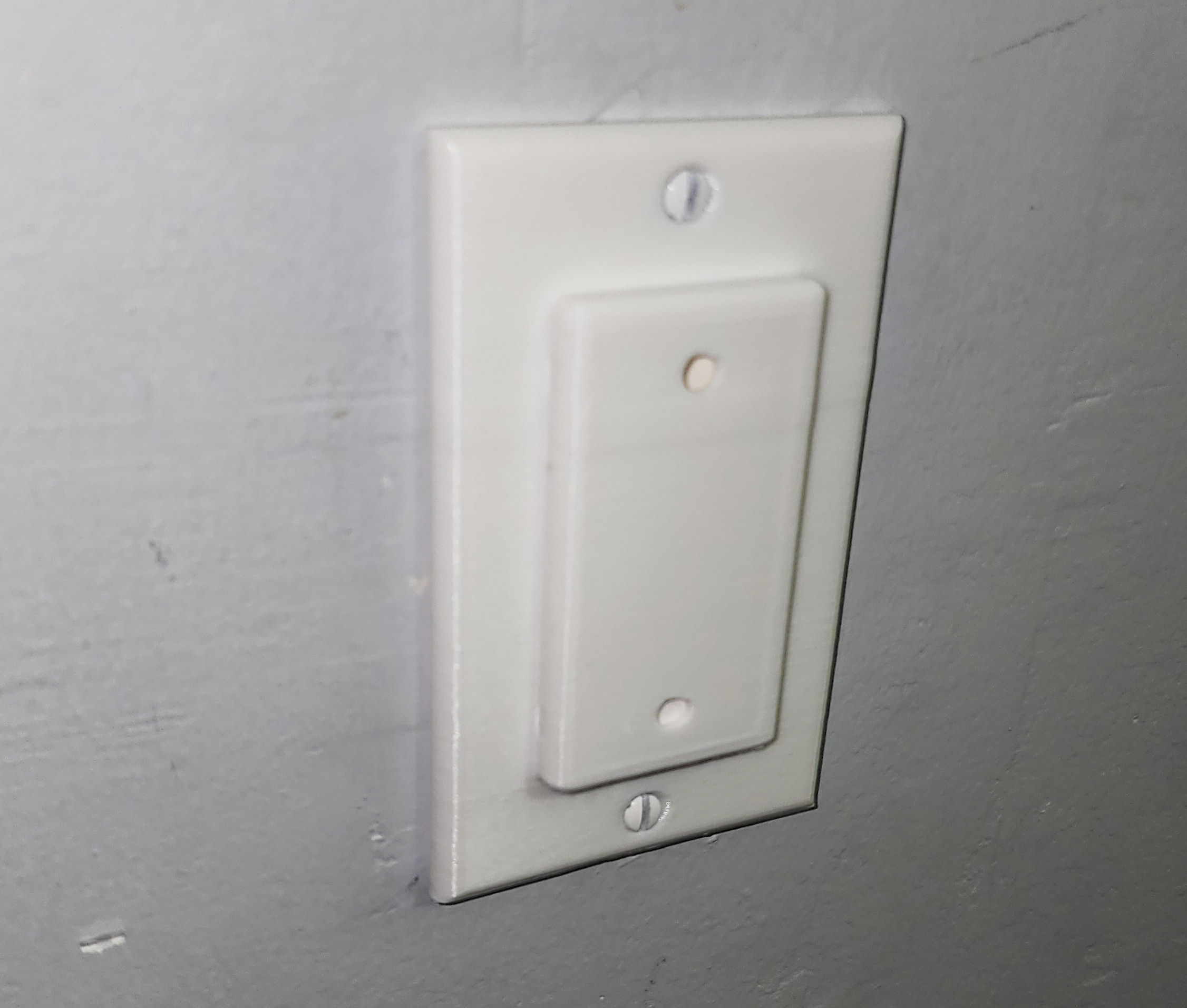 Tamperresistant rocker light switch cover by Triple G