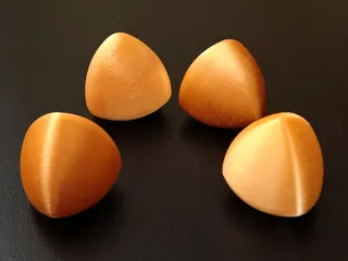 Rounded symmetric spheroform tetrahedron