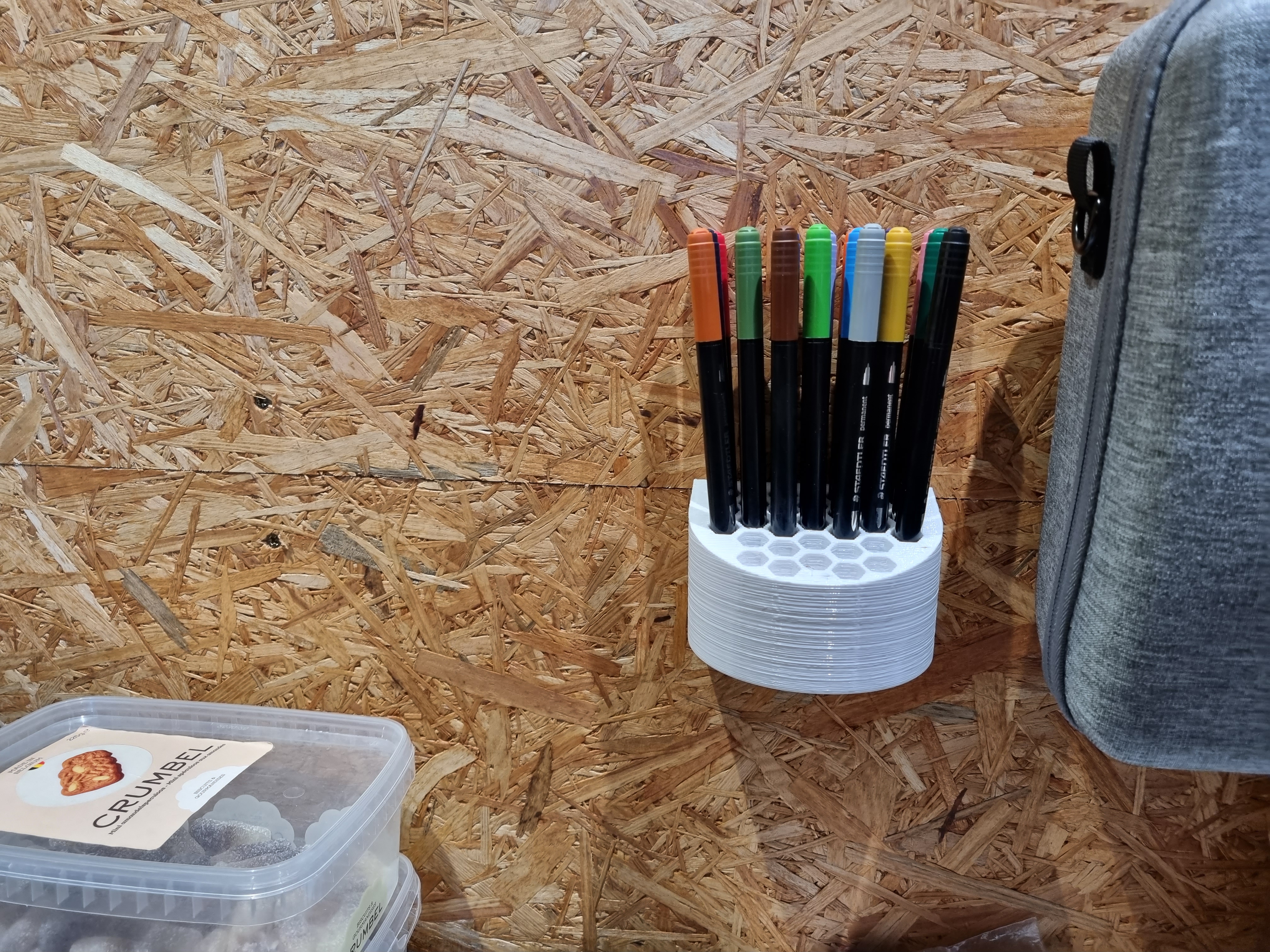 Wall mounted pen holder - hidden screws