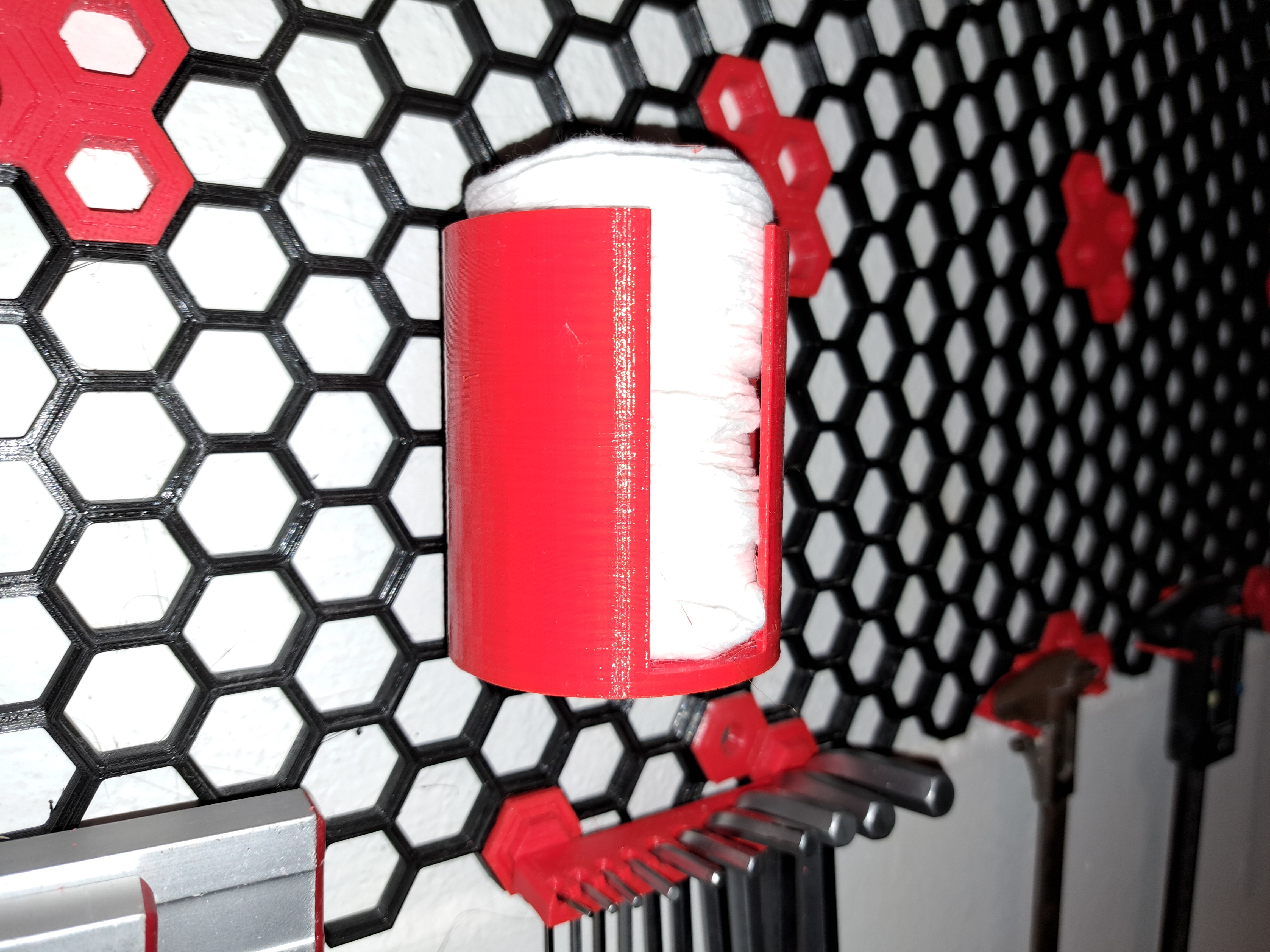 Cotton pad dispenser for honeycomb storage wall