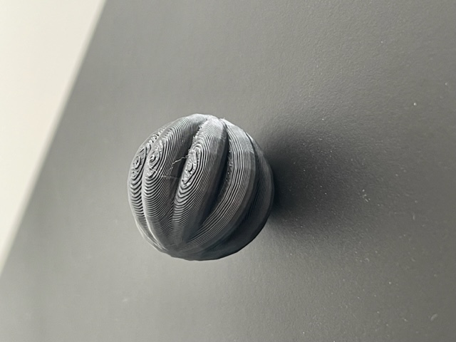 Wonky ball cat toy