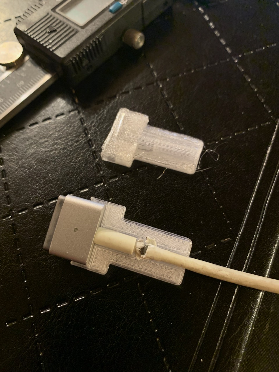 Strain relief thing for MacBook power cord 85W MagSafe 2