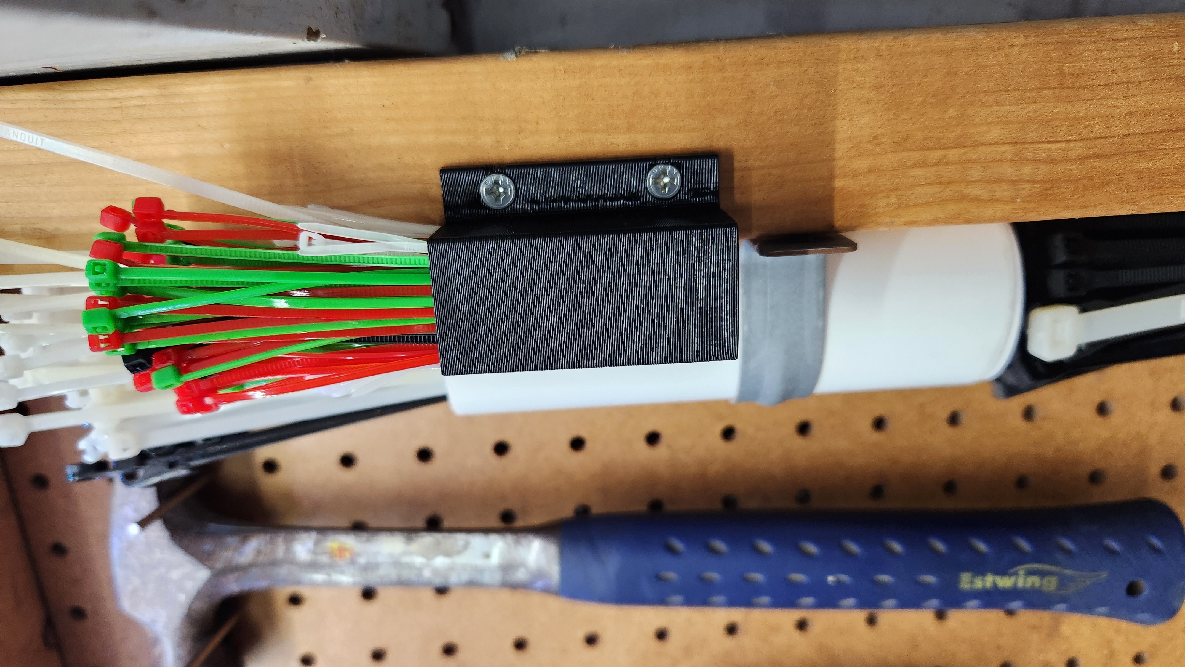Container with vertical screw holes