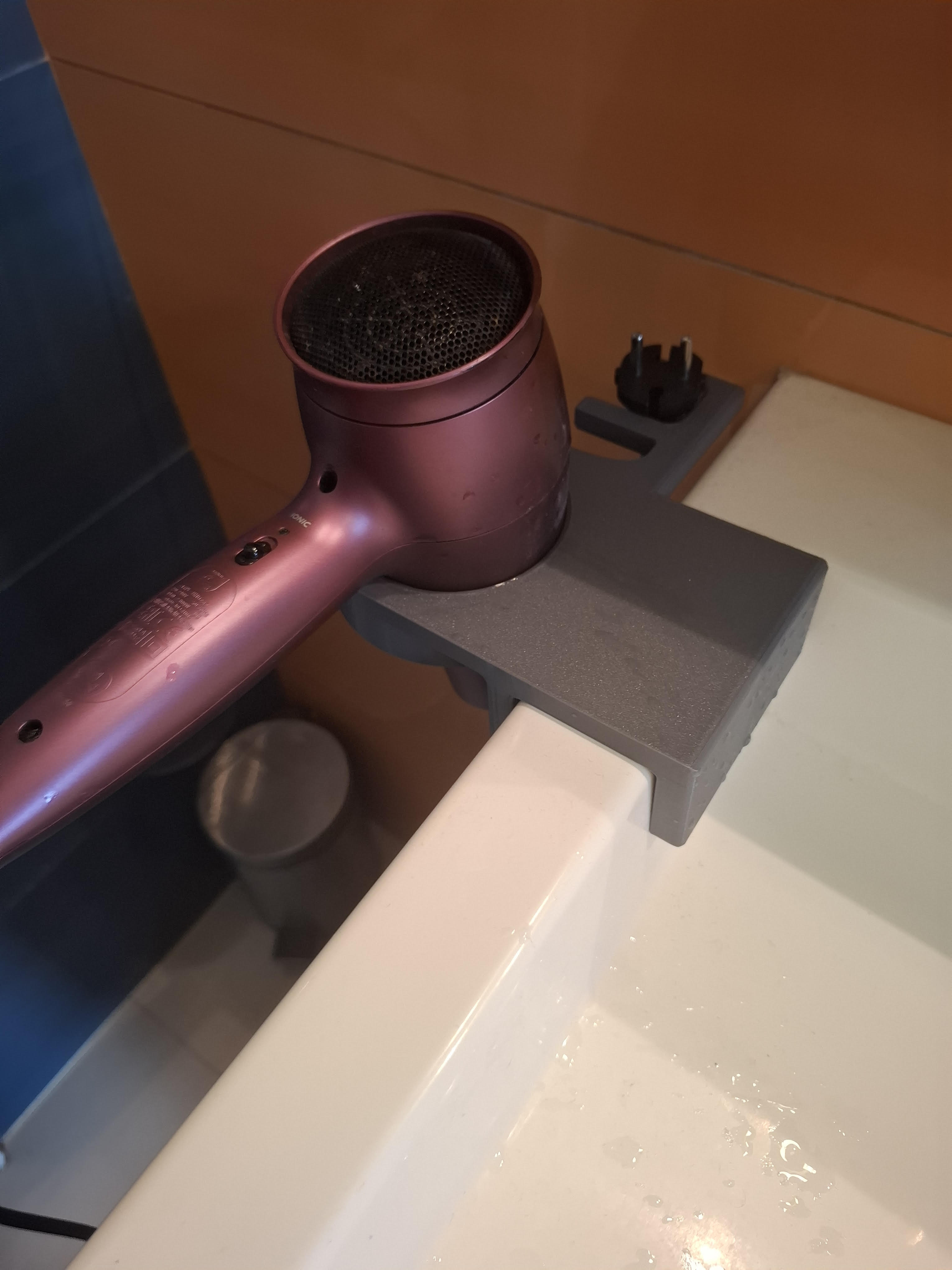 Hair dryer holder