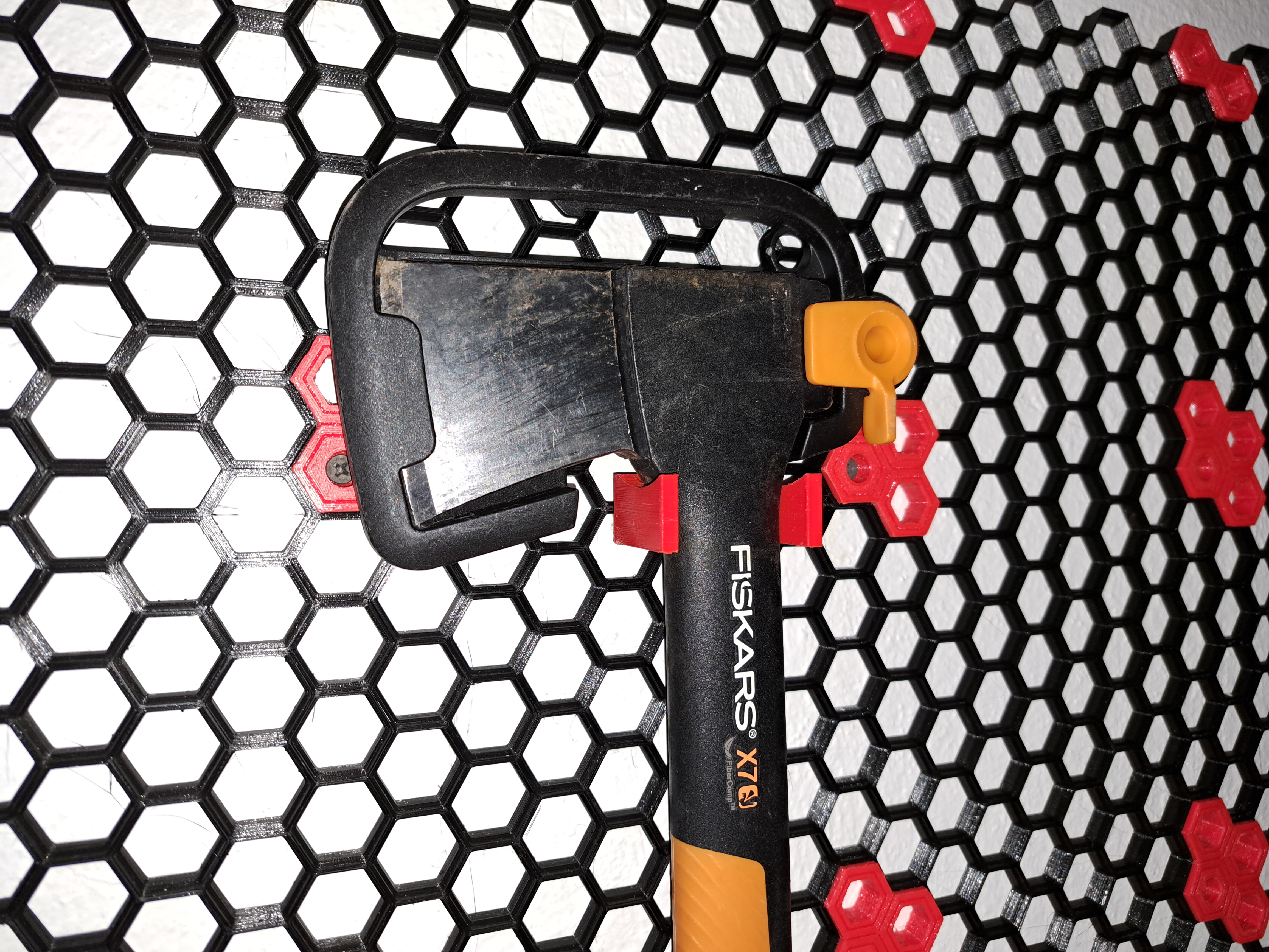 Holder for multiple tools for honeycomb wall
