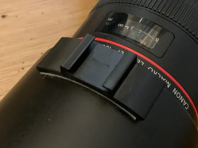 Hot shoe for camera lens hood