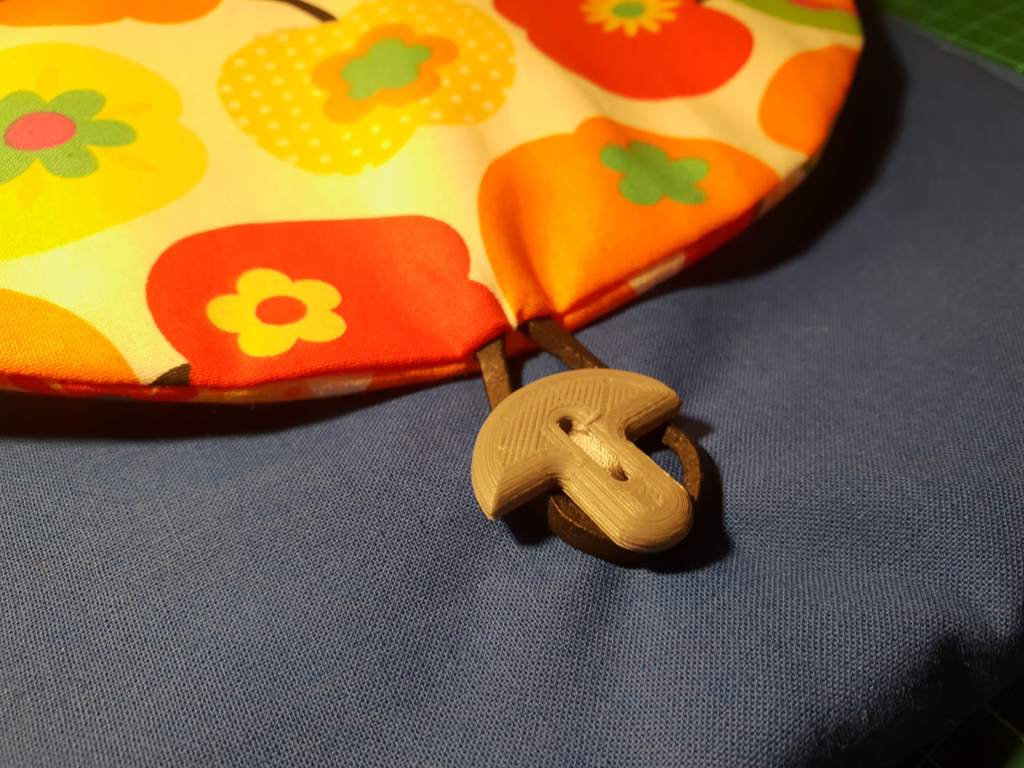 Mushroom shaped button