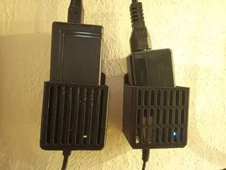 Wall mount for notebook power supply