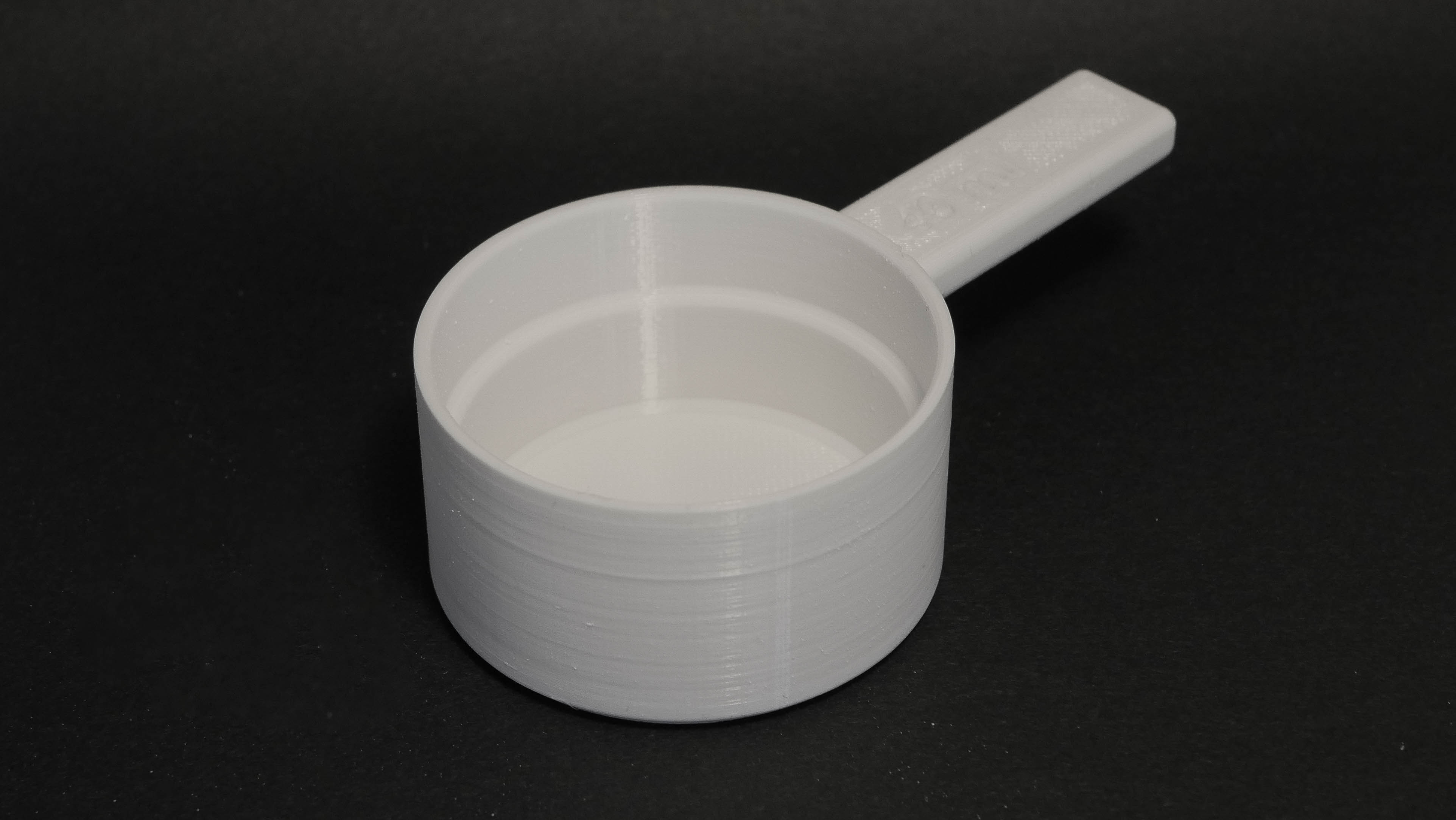 Measuring cup / spoon 40ml
