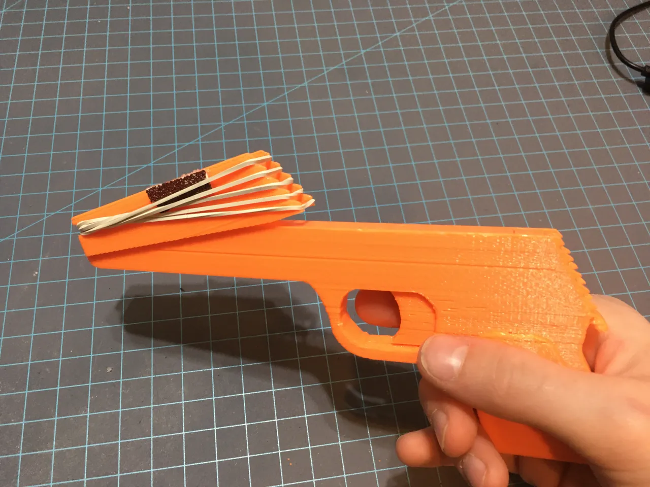 how to make a rubber band gun