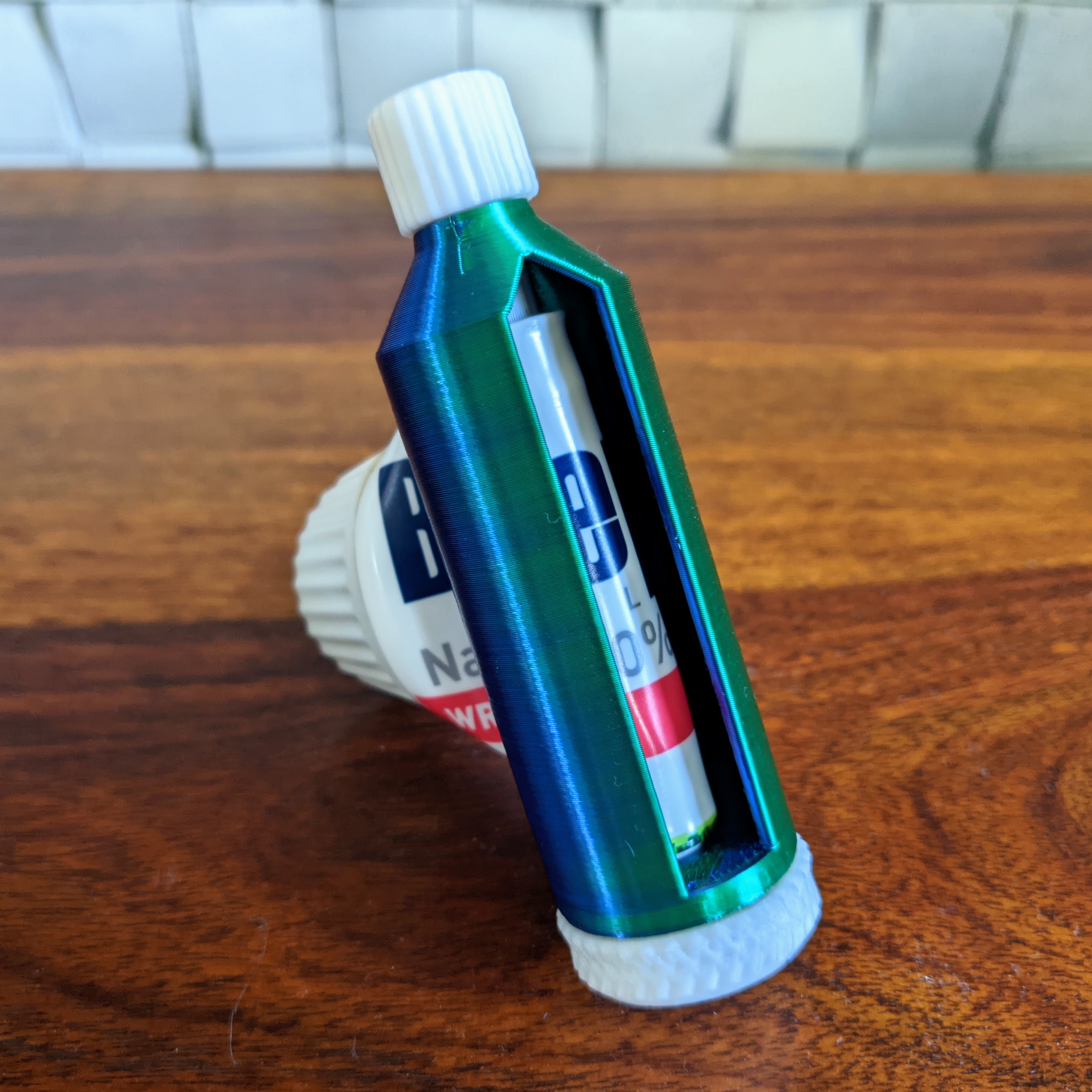 More enclosed body for ratchet toothpaste squeezer