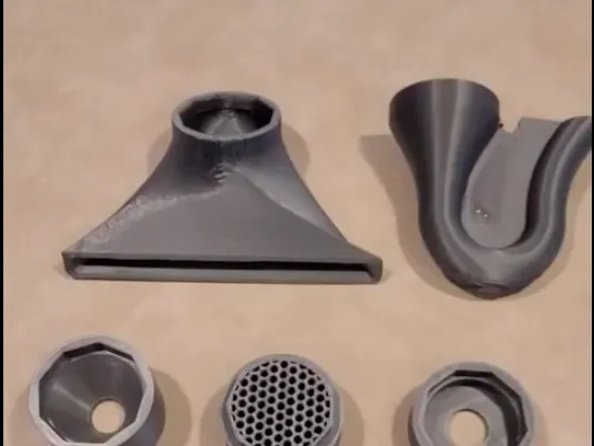 Laminar (mostly) flow tub faucet adapter with swappable spout modules