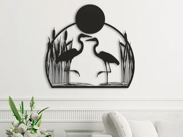 Two herons in the reeds