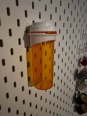 A Pill bottle stand for four Walgreens bottles - one large, two medium and  one small by NotLikeALeafOnTheWind, Download free STL model