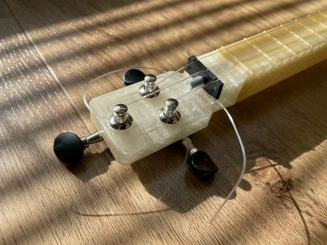 Playable 3 String ukulele-like instrument V4 with improved head