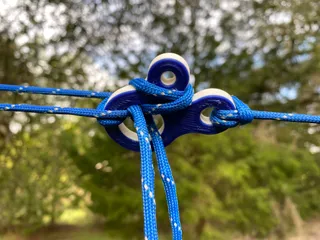 Tent Cord Tensioner by Steven Erickson