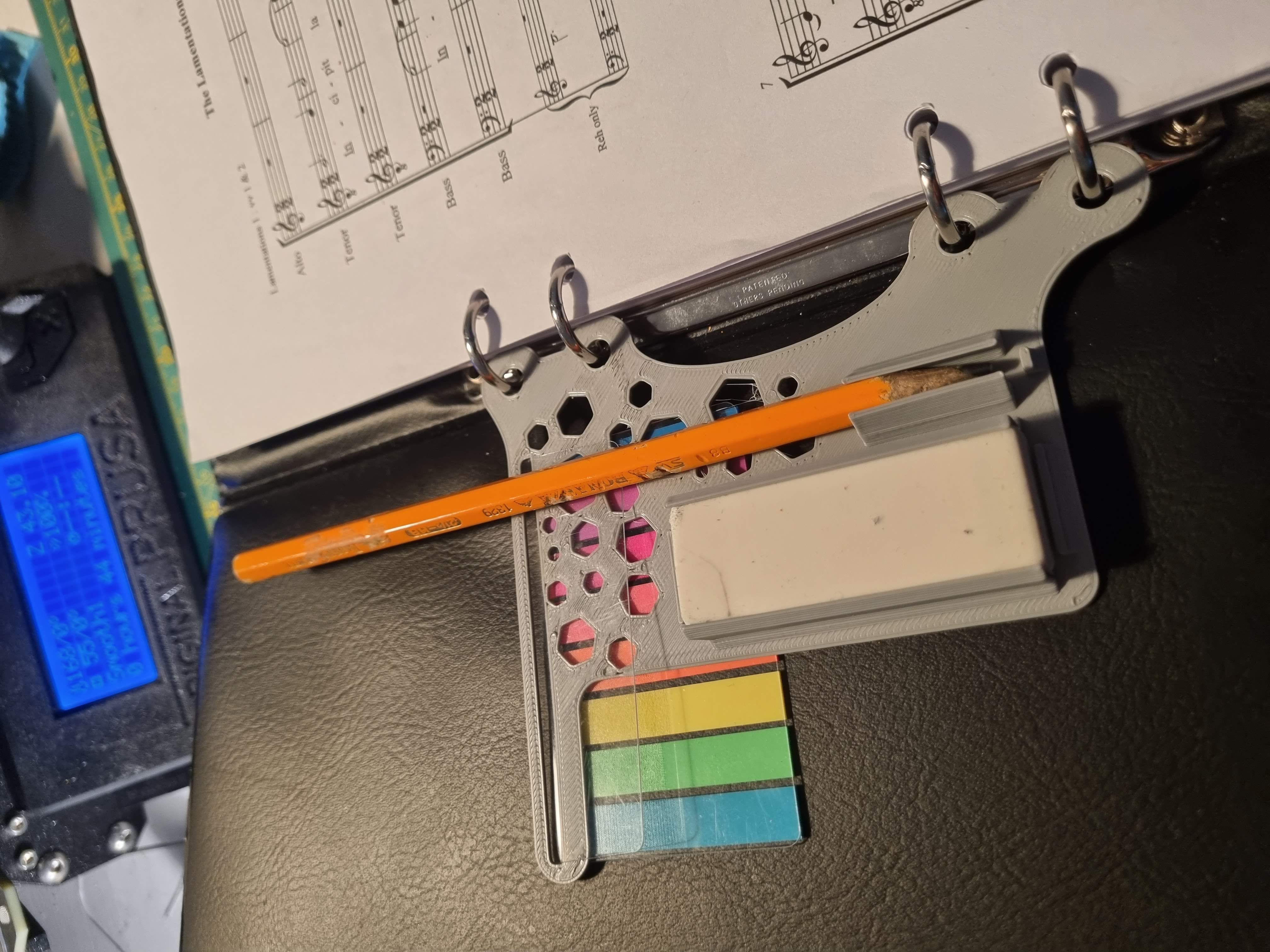 Ring binder pen holder, erase, sticky page markers by Gauthier