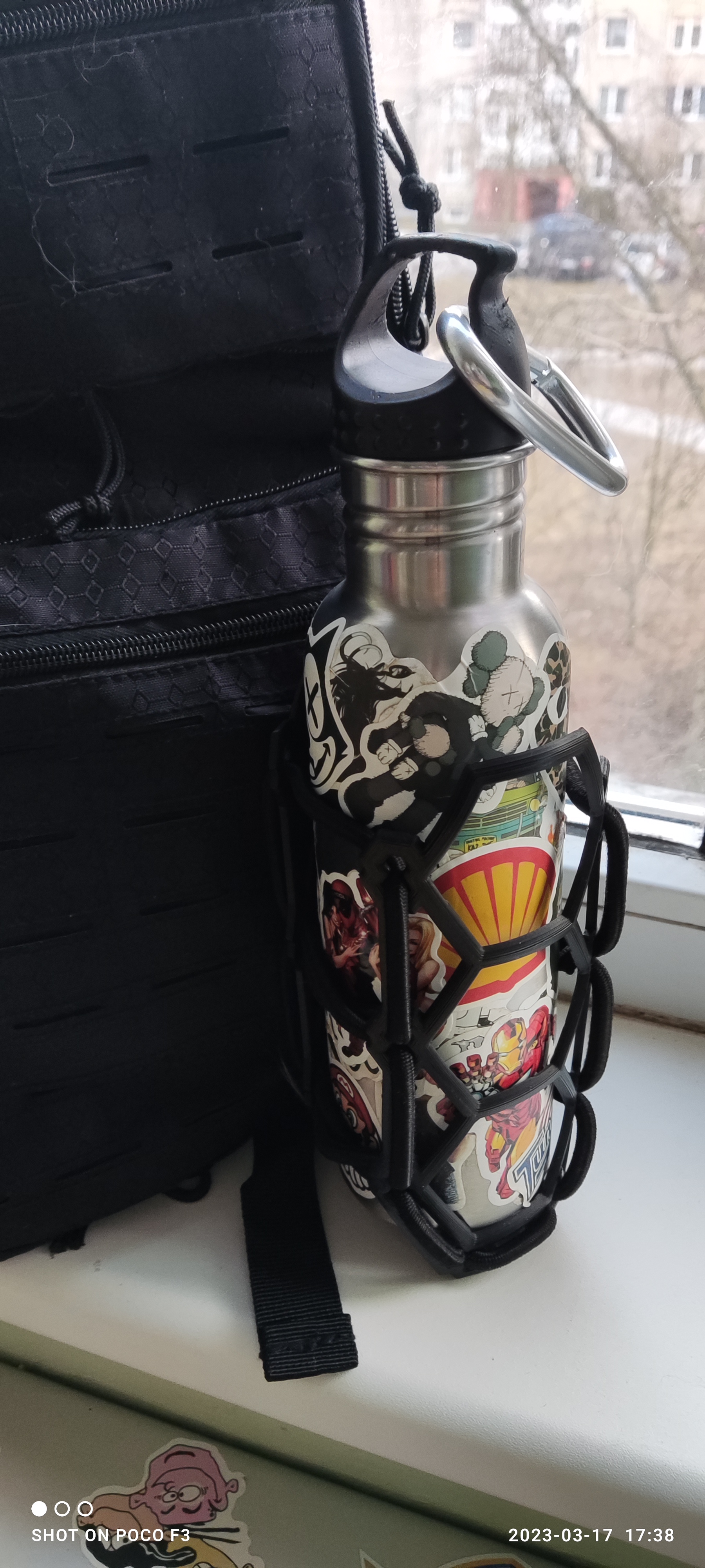 Molle water bottle holder. Molle universal holder