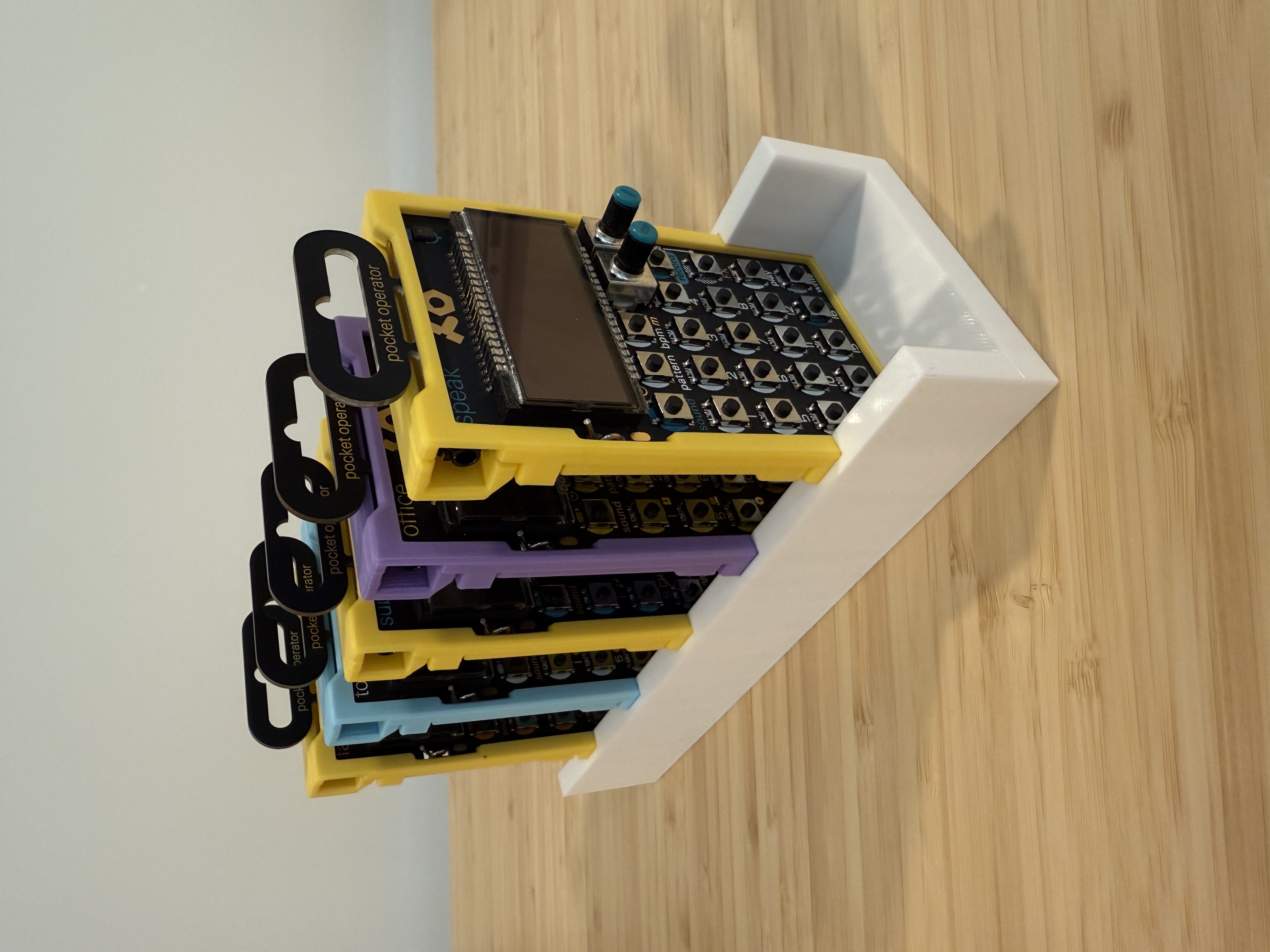 Pocket Operator + more minimalist case holding rack