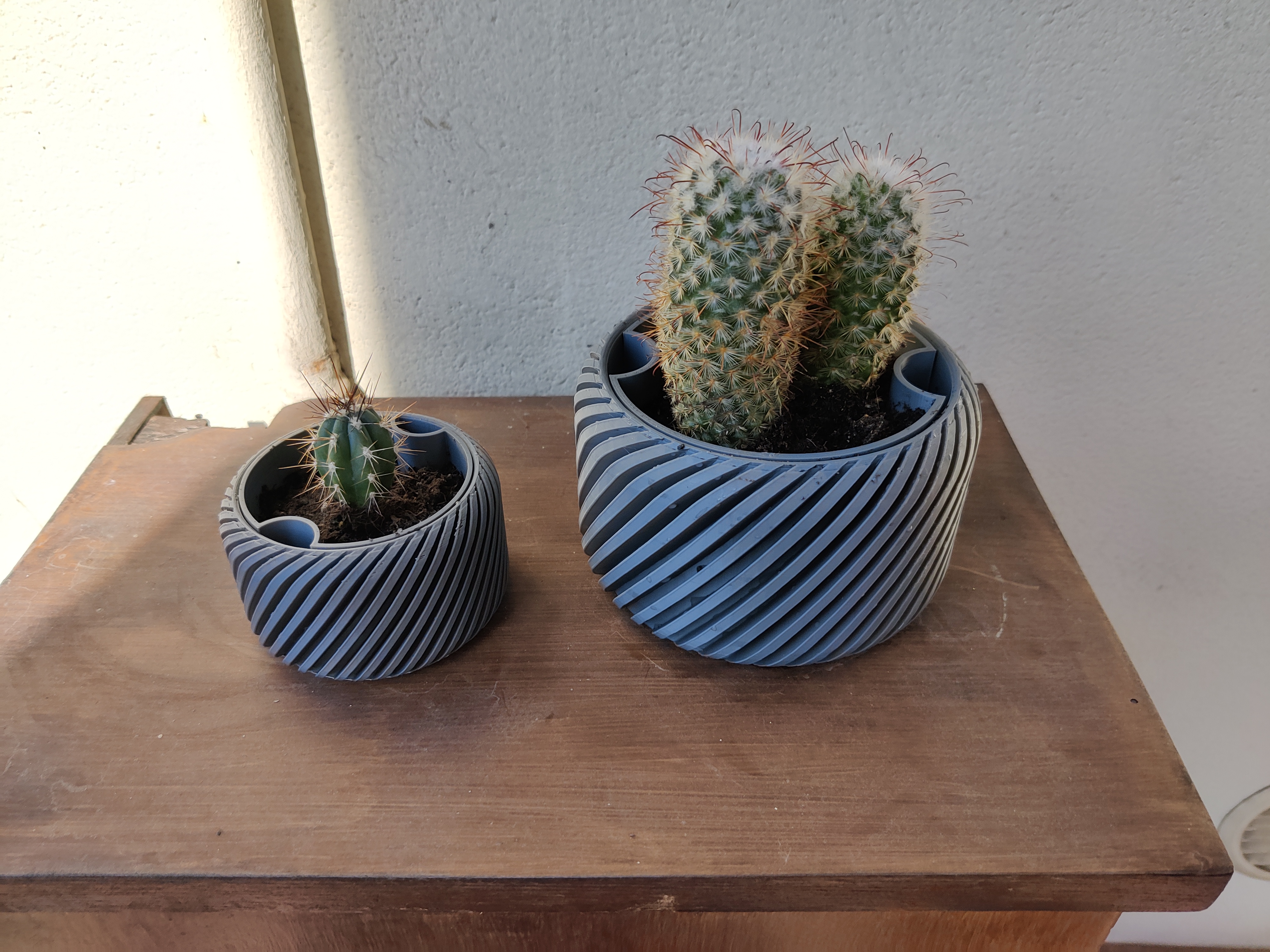 Helical Self Watering Pots with draining holes