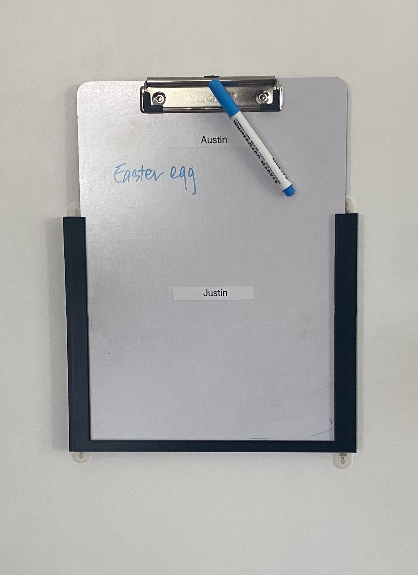 Clipboard holster for out-the-door reminders