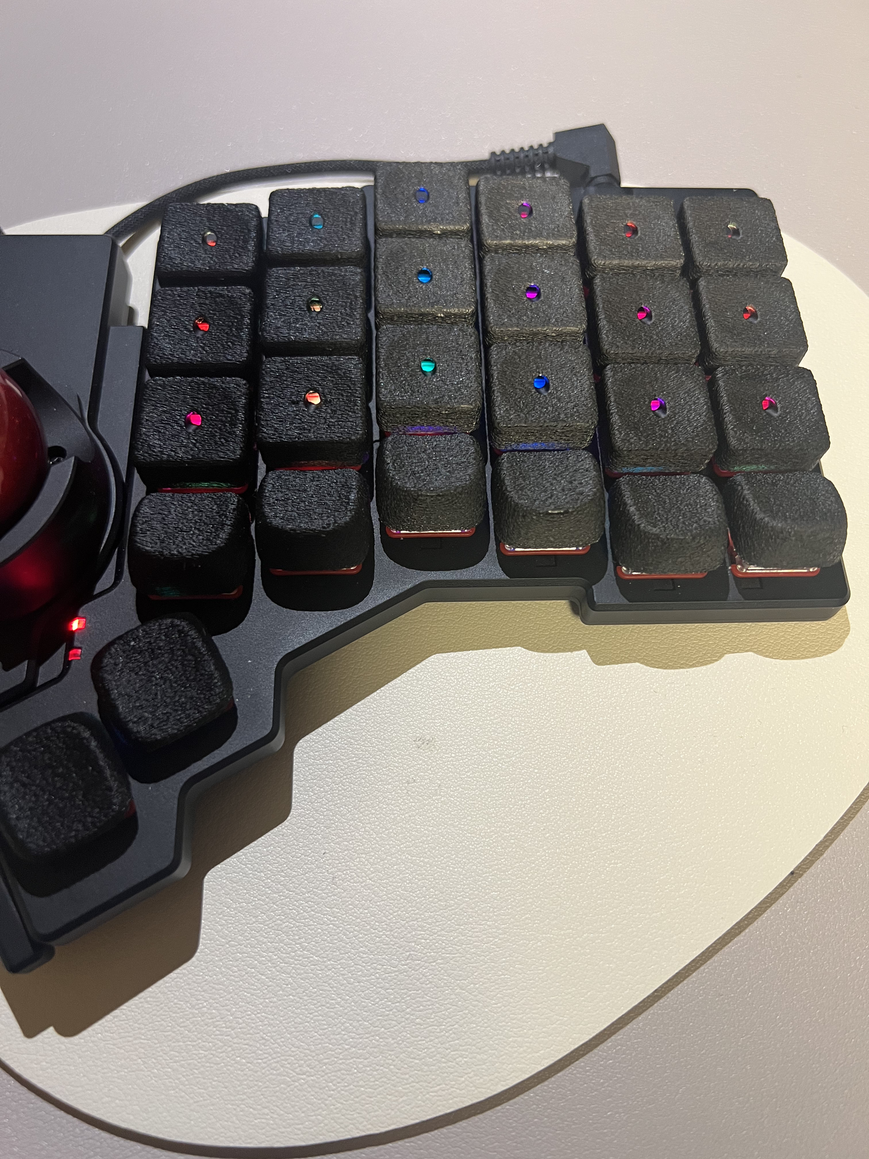 Custom shine through keycaps for ZSA Voyager