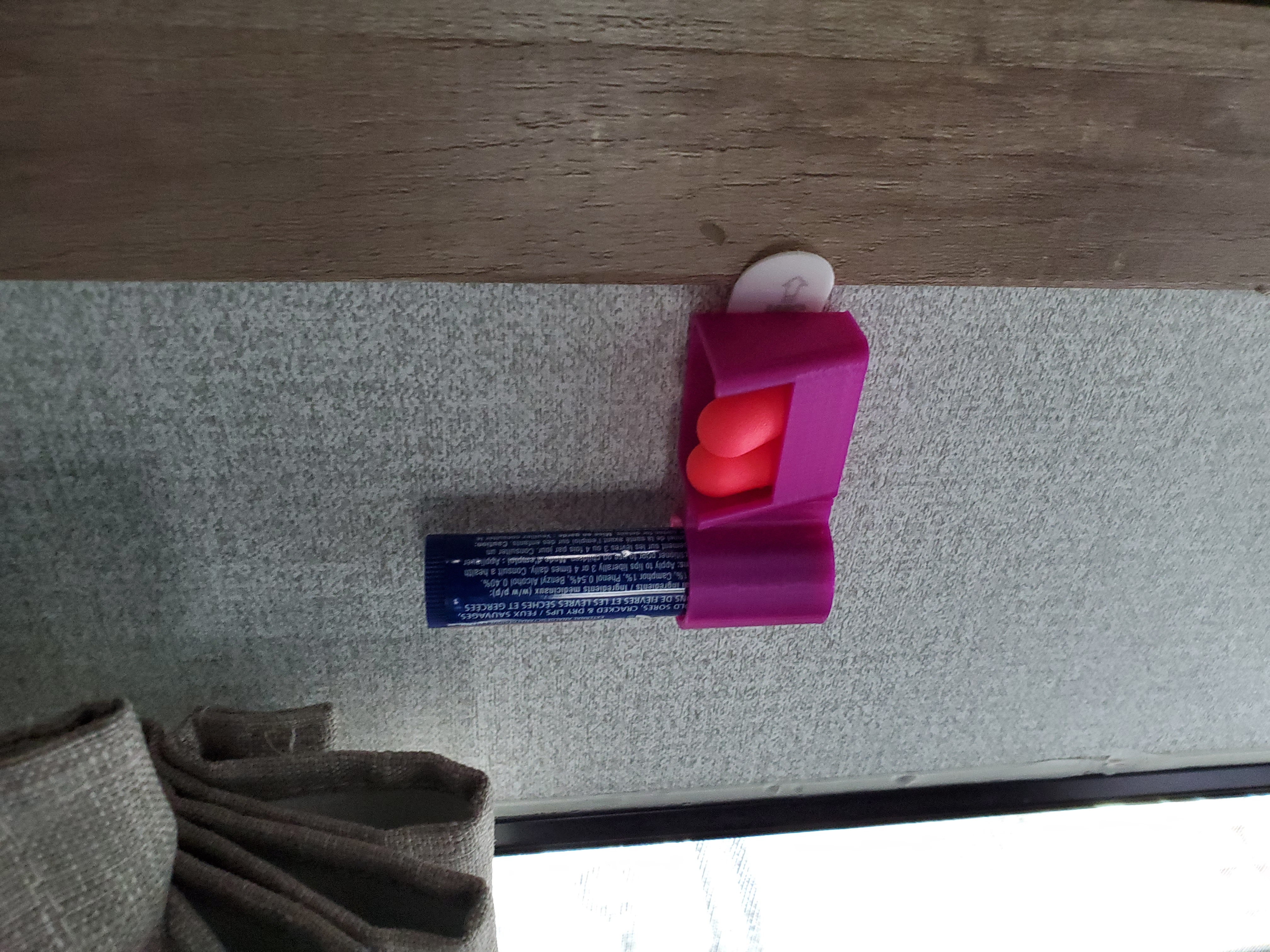 Holder for Chapstick and ear plugs