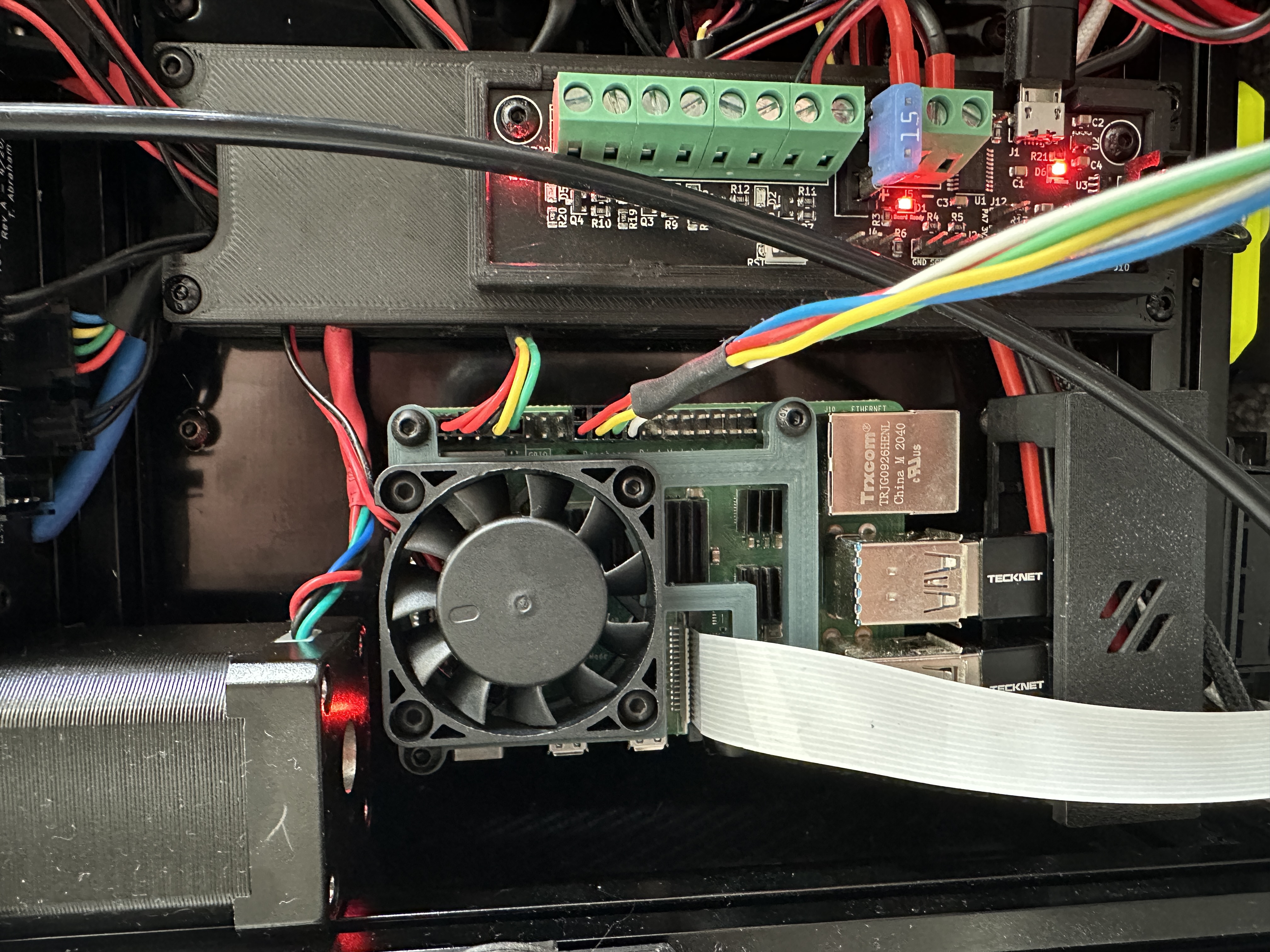 Raspberry Pi 40mm Fan Mount, with access to camera port.