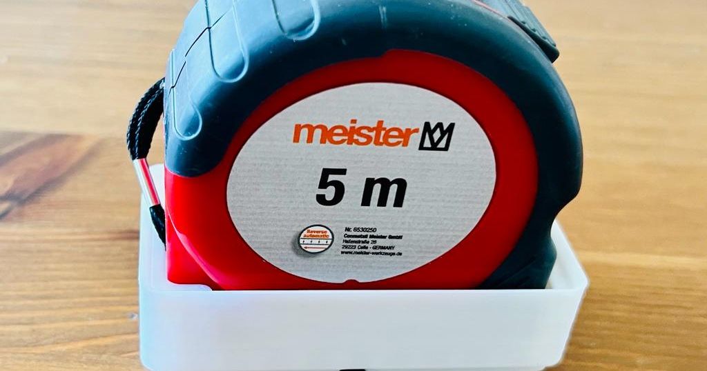 Tape Measure Holder by Coriux Download free STL model