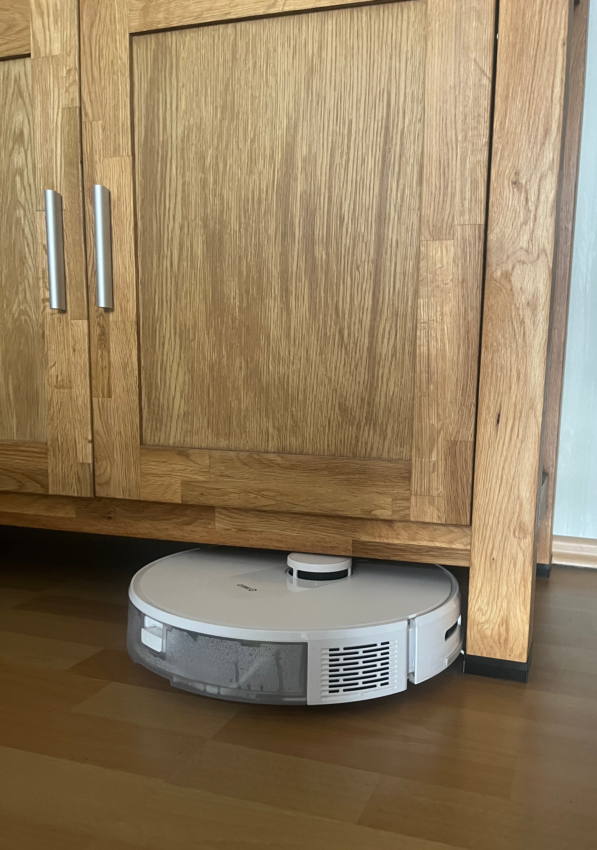 robot-vacuum-cleaner-friendly-raiser-for-sideboard-parameterized-by