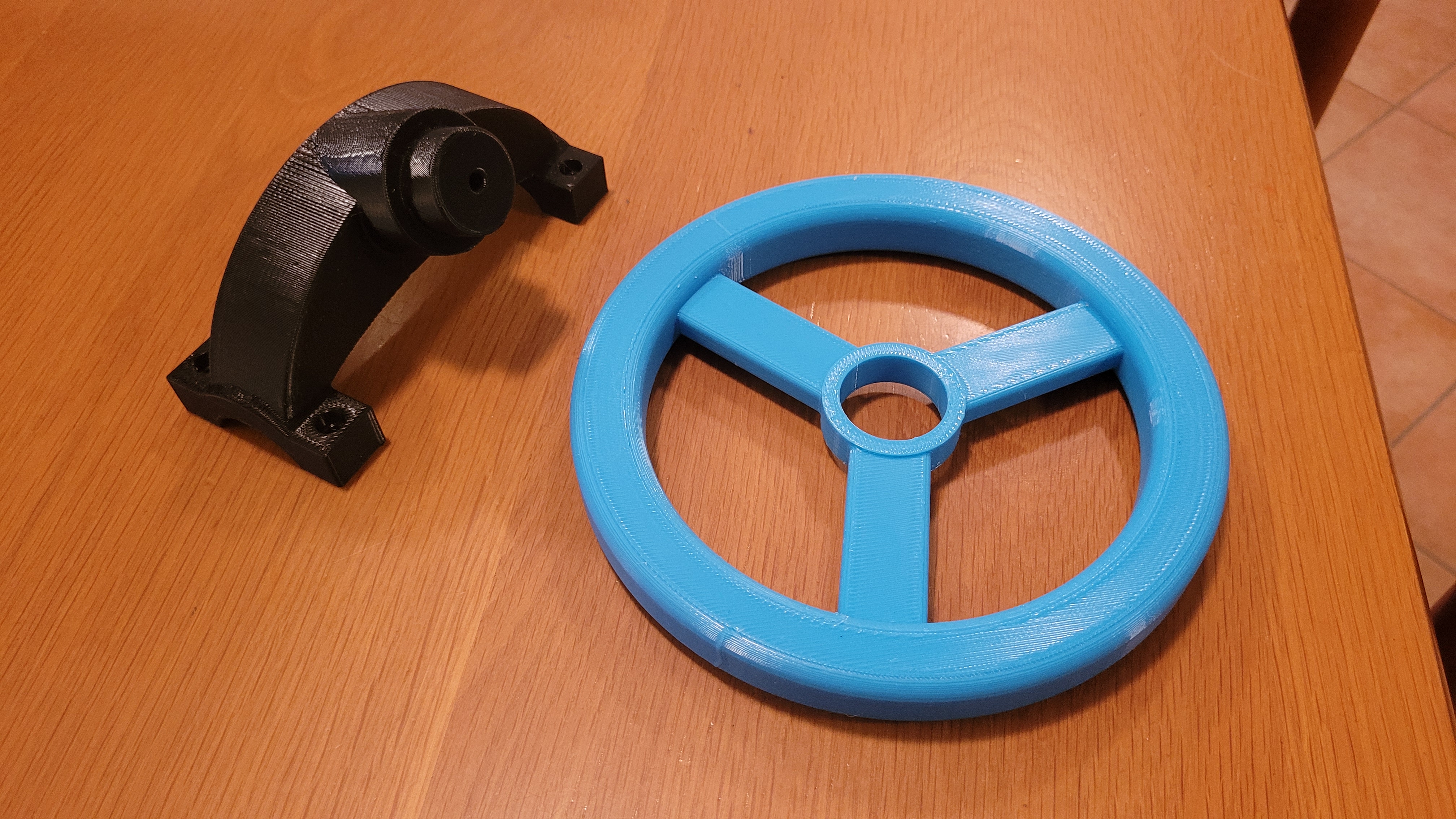 Single pieces steering wheel for stroller