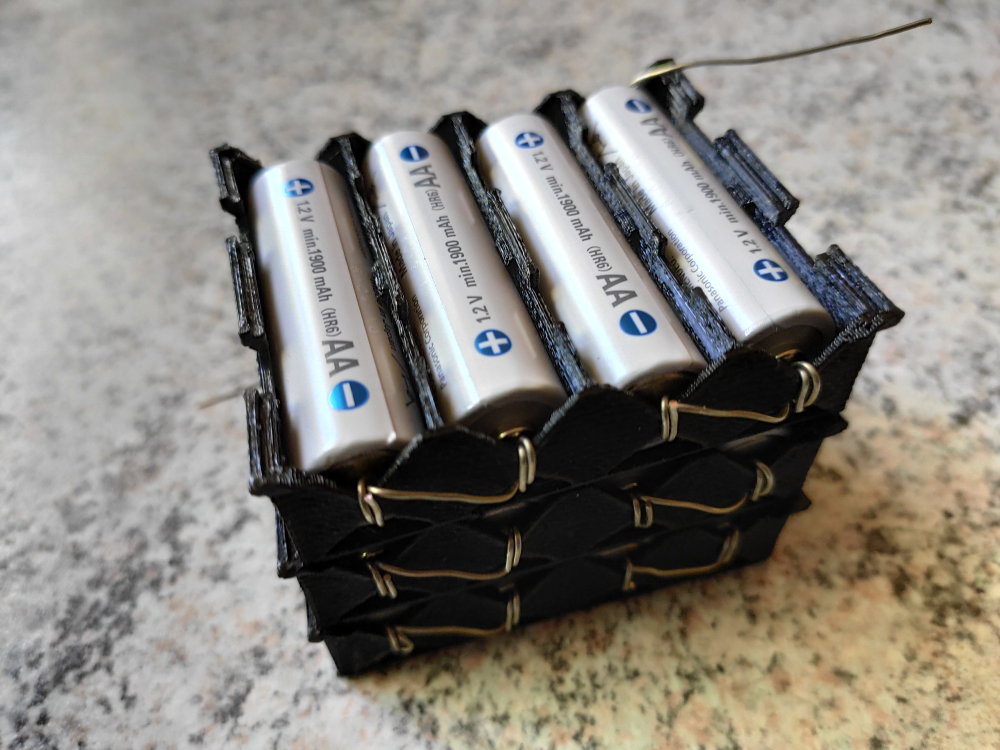 Stackable battery holder for 4 AA batteries by tr8 Download free STL