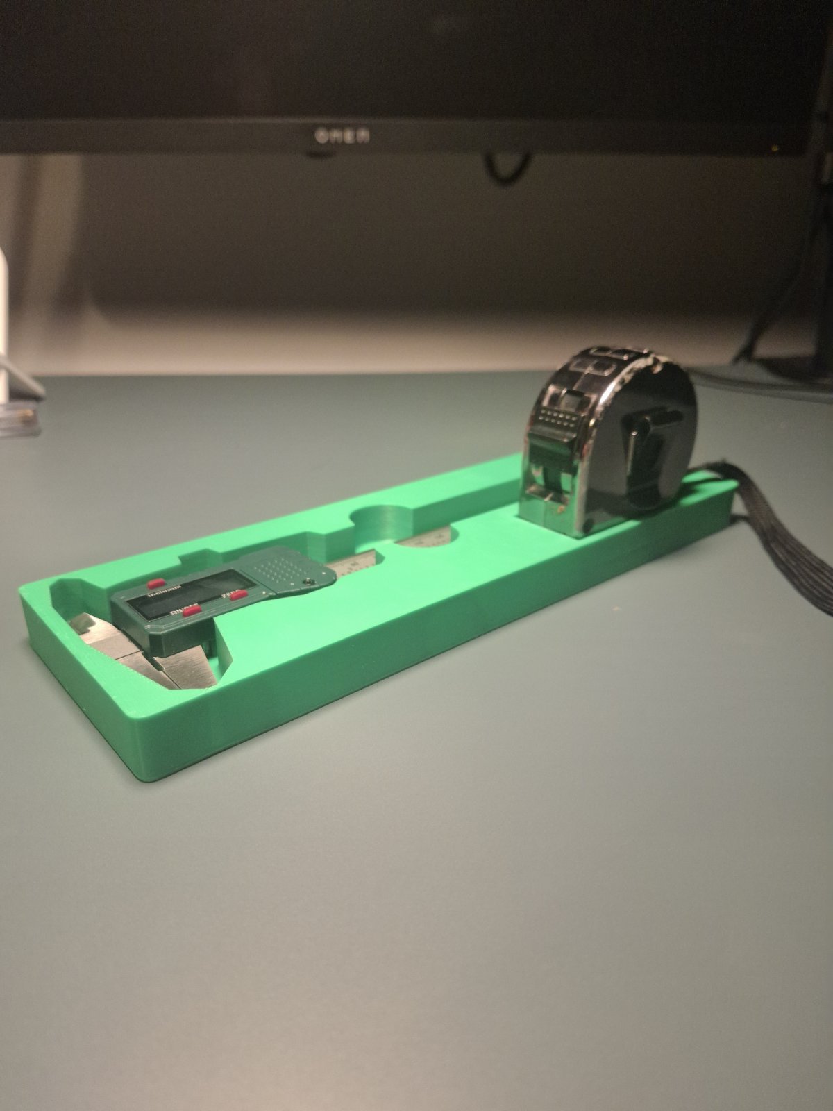 CALIPER AND TAPE MEASURE STORAGE