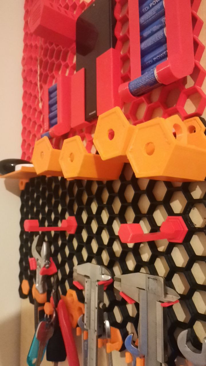 Folding ruler holder for honeycomb storage wall (HSW)