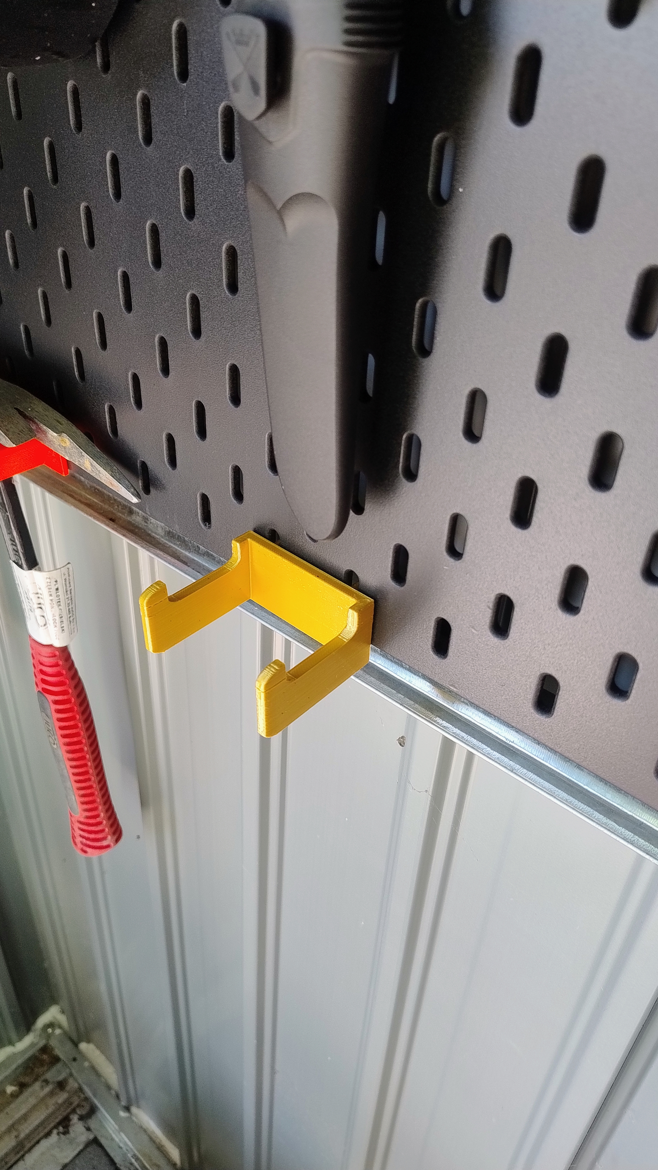 Skadis Axe Holder. Uchwyt na siekierę Skadis.