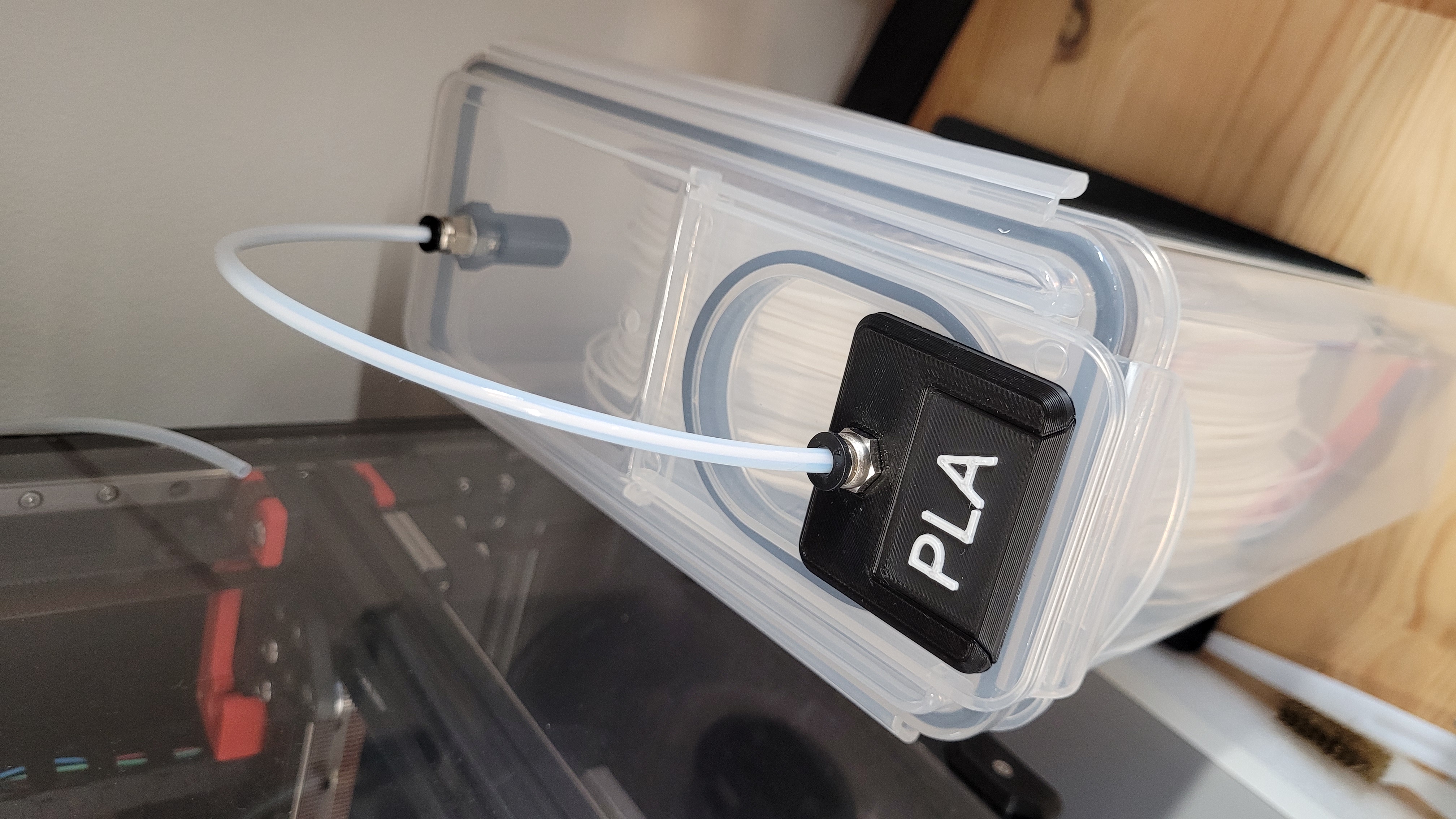 Filament box label holder