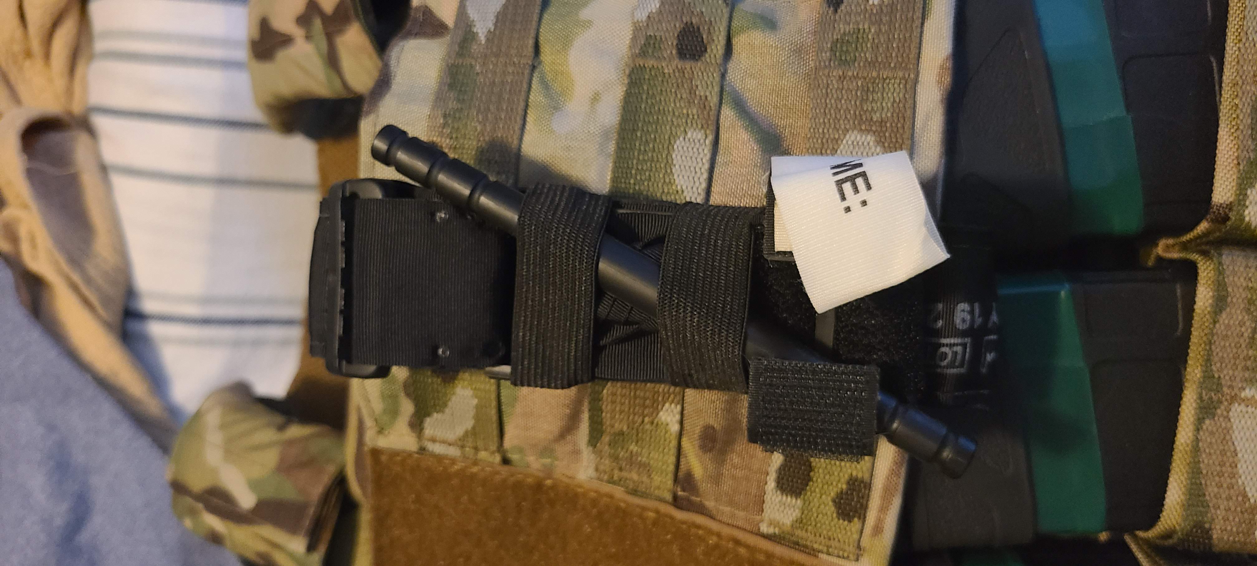 Tourniquet holder for molle