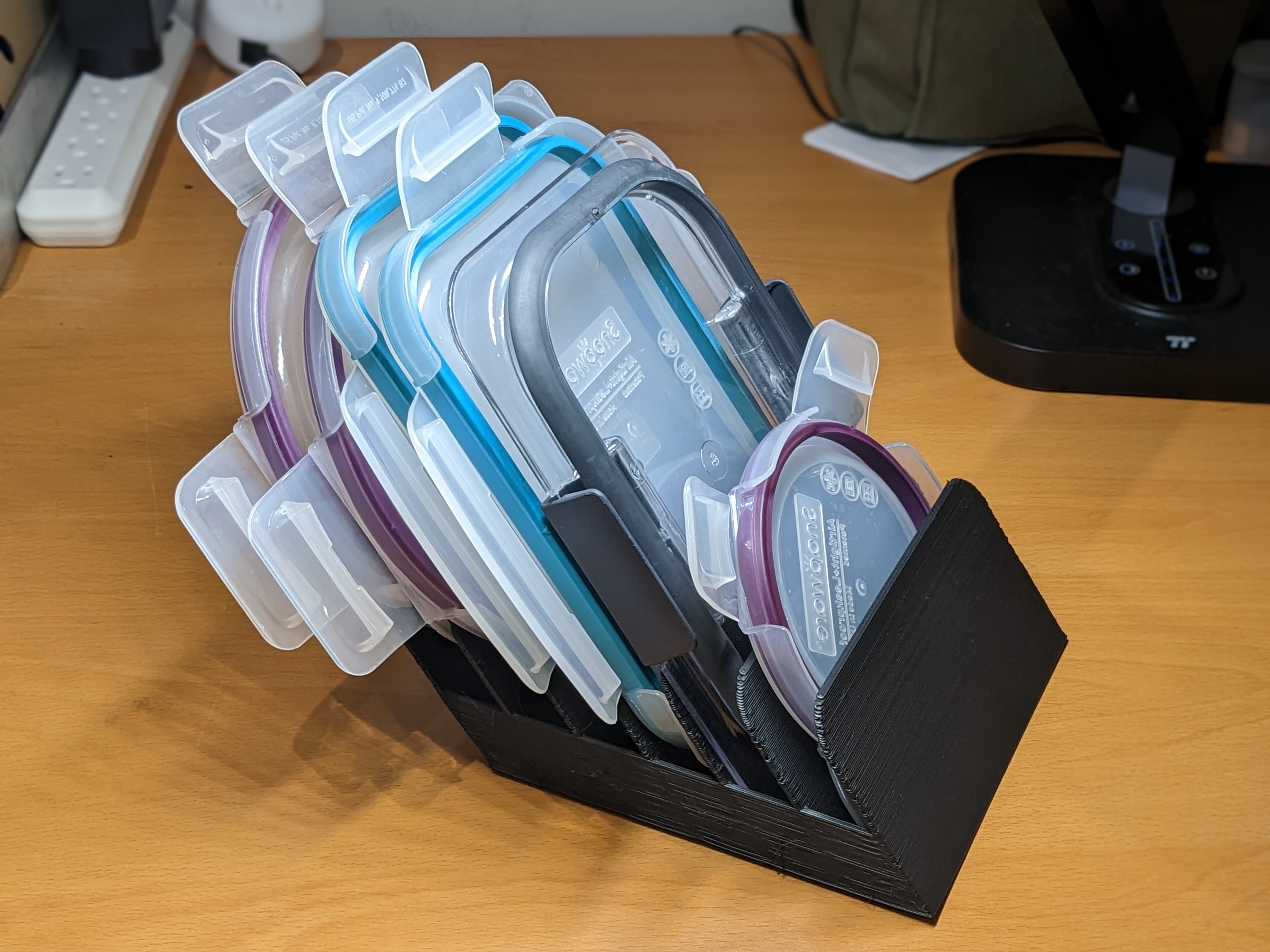 Angled Tupperware Lid Holder