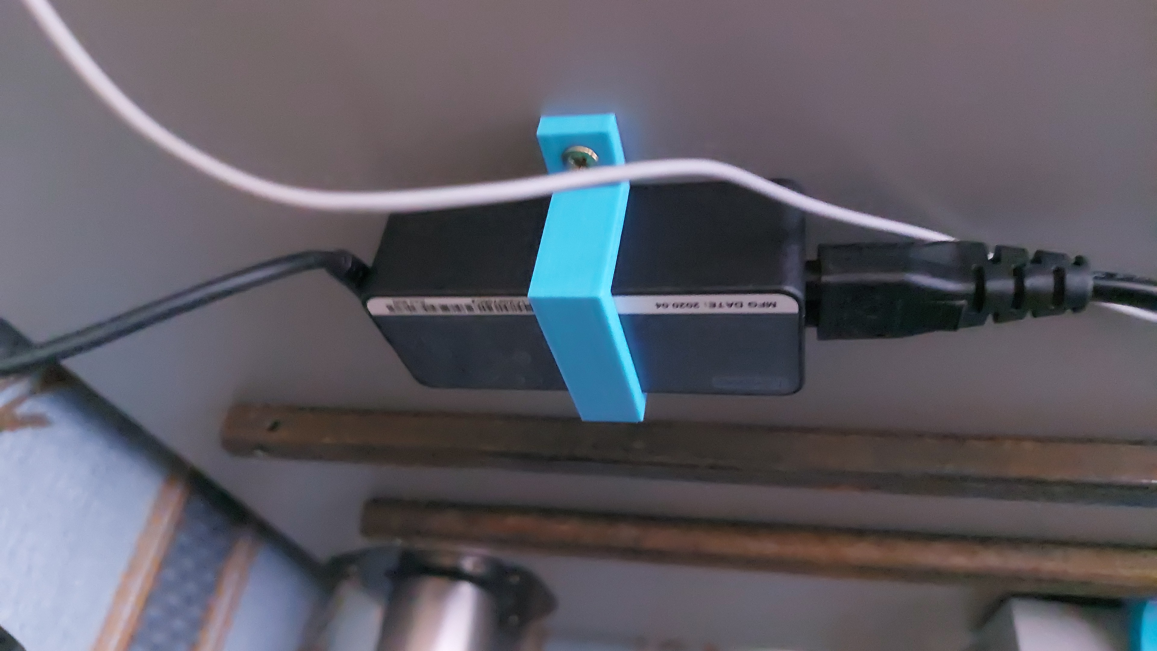 Universal under-desk holder