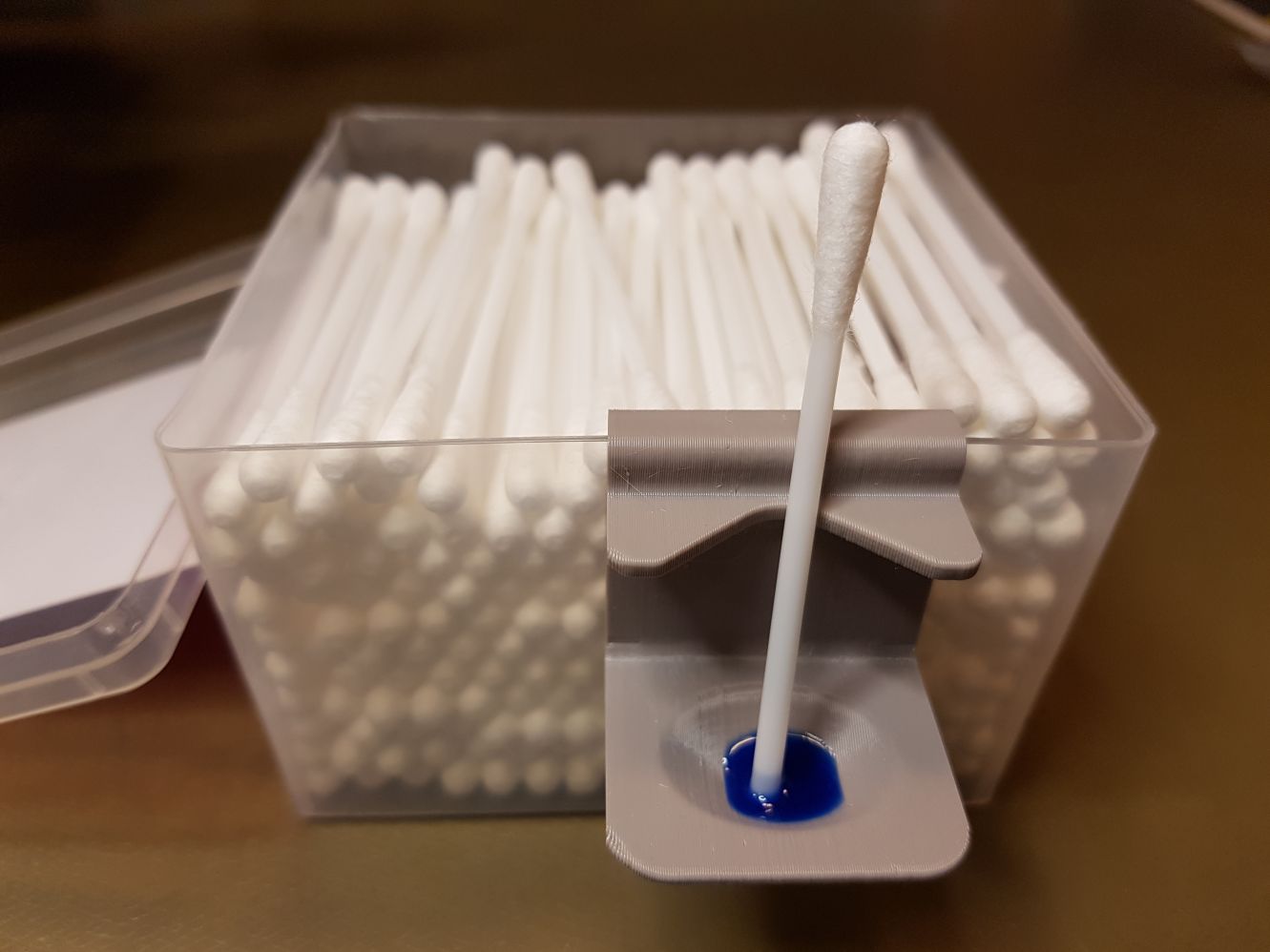 Glue holder for q-tip box