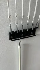 Wall ancor/hook for retractable ceiling mounted clothesline