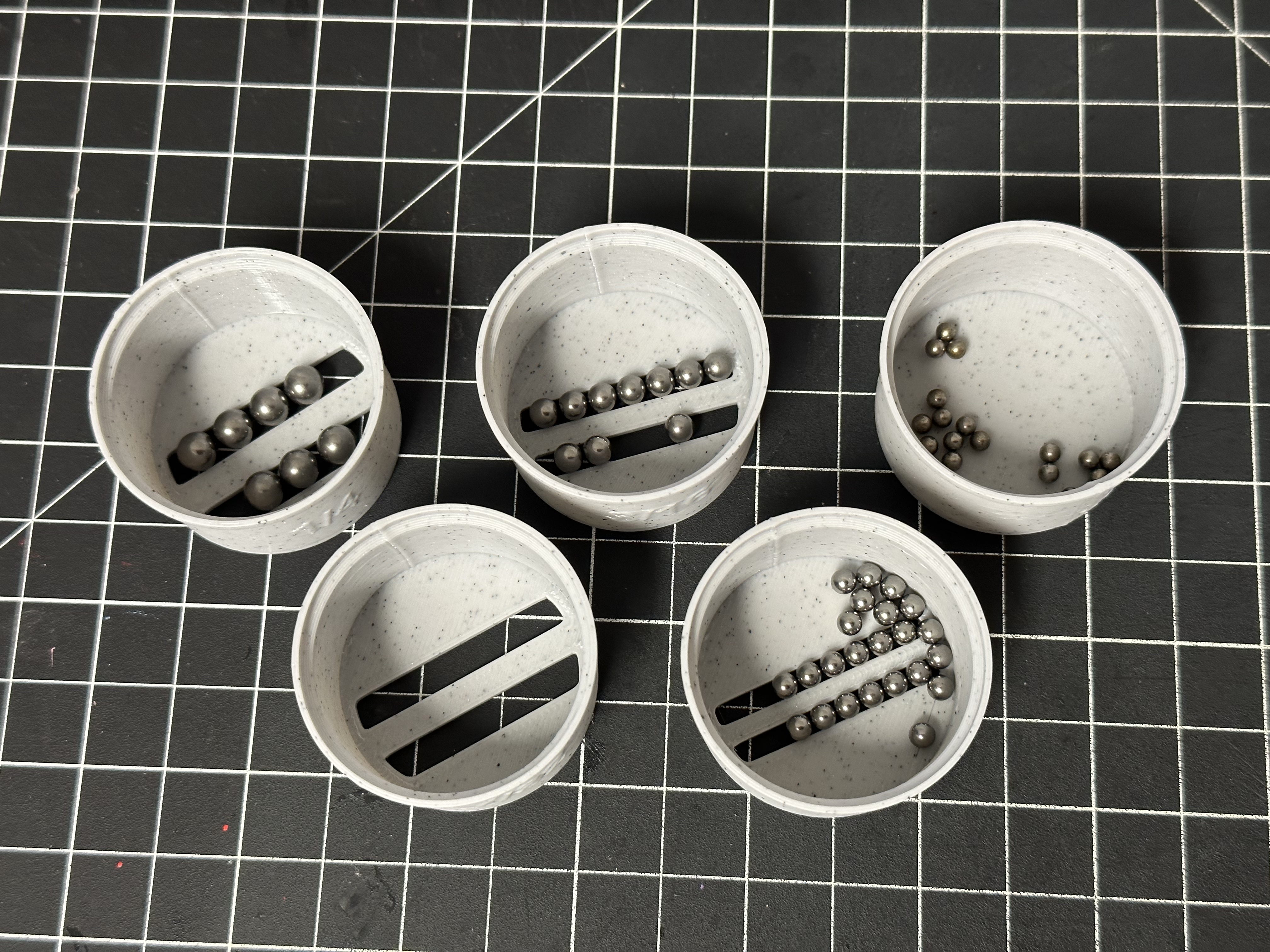 Ball bearing sorter cups for bicycle sized bearings
