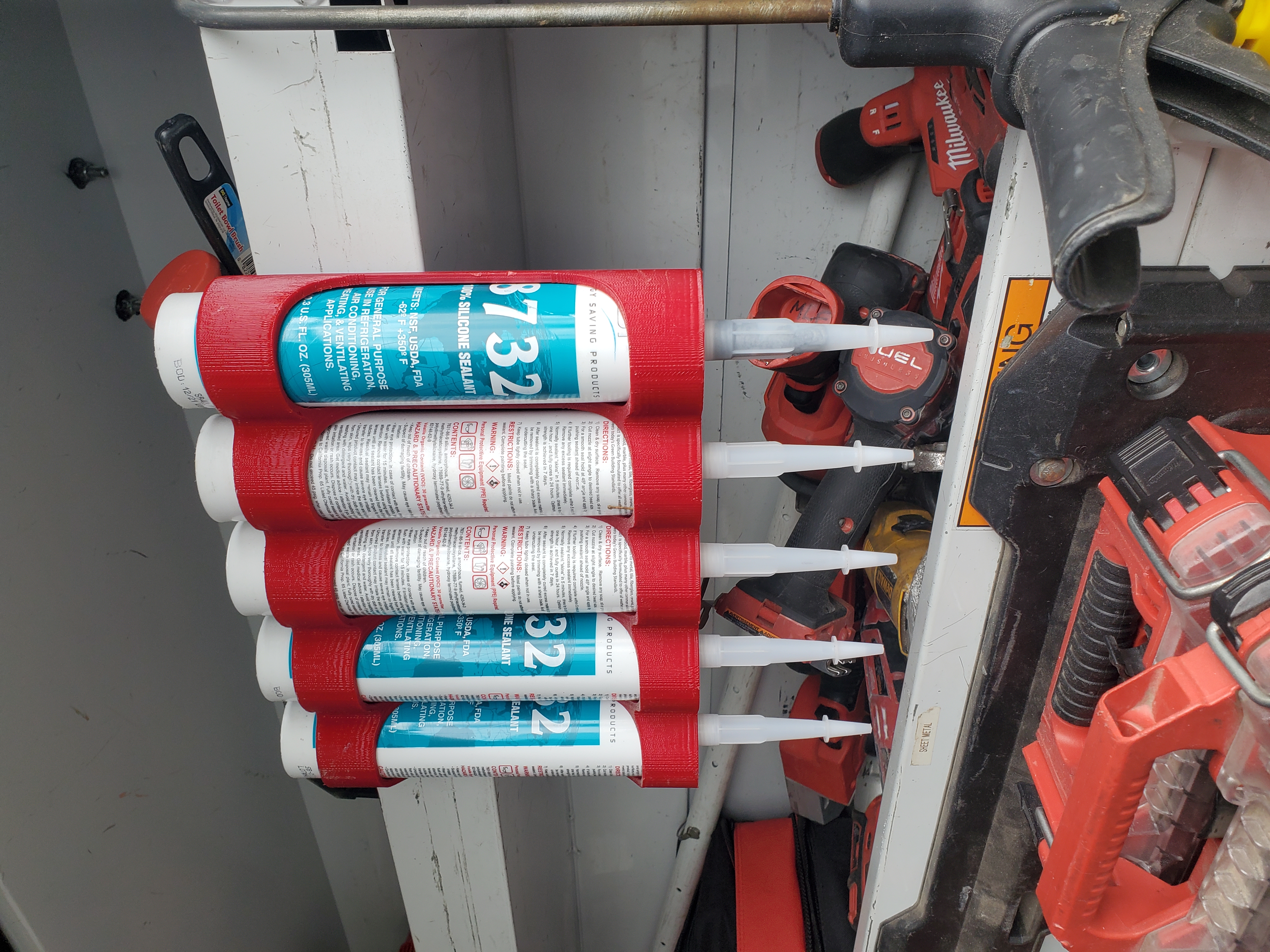 Hanging caulk tube organizer