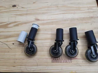 old - Roller caster support for a plastic shelf unit - old