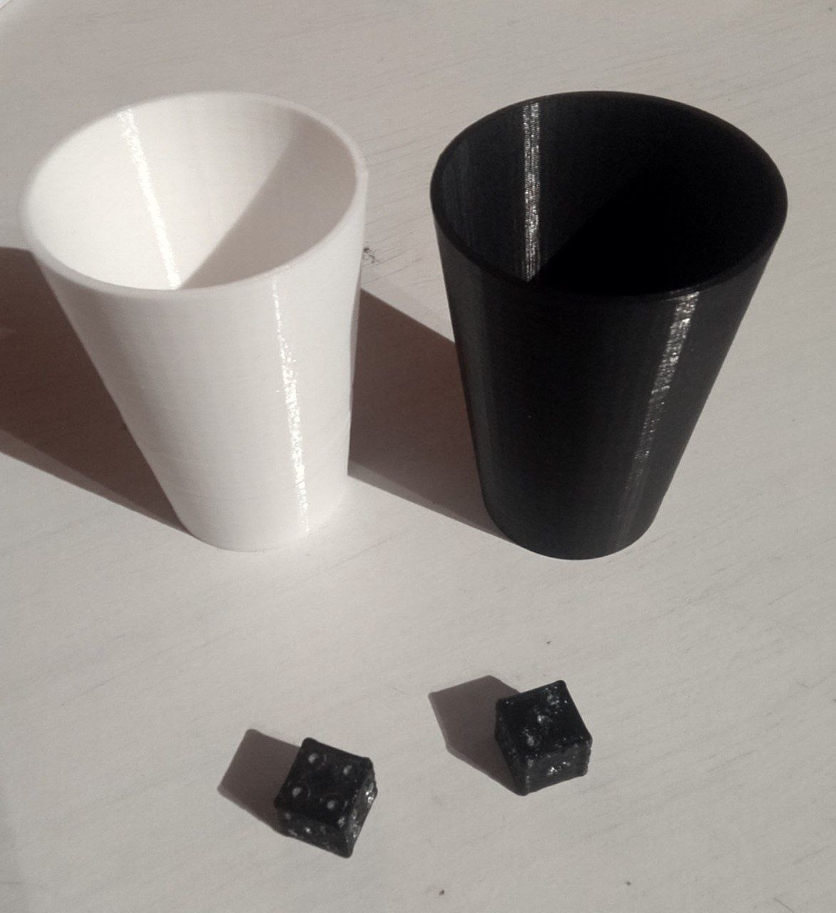 dice cup and dices