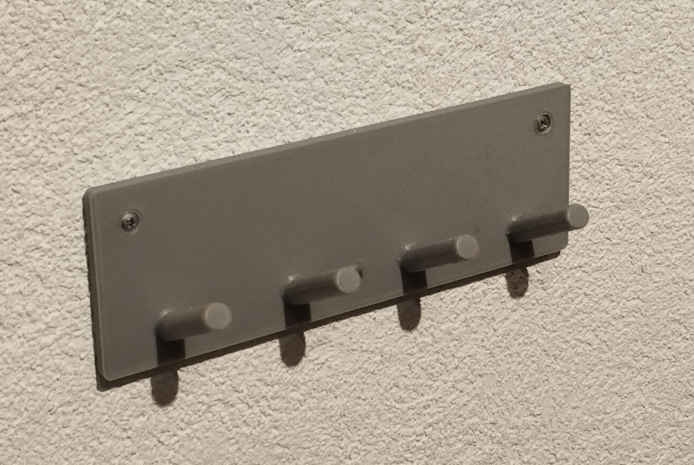 Wall-mounted key hooks