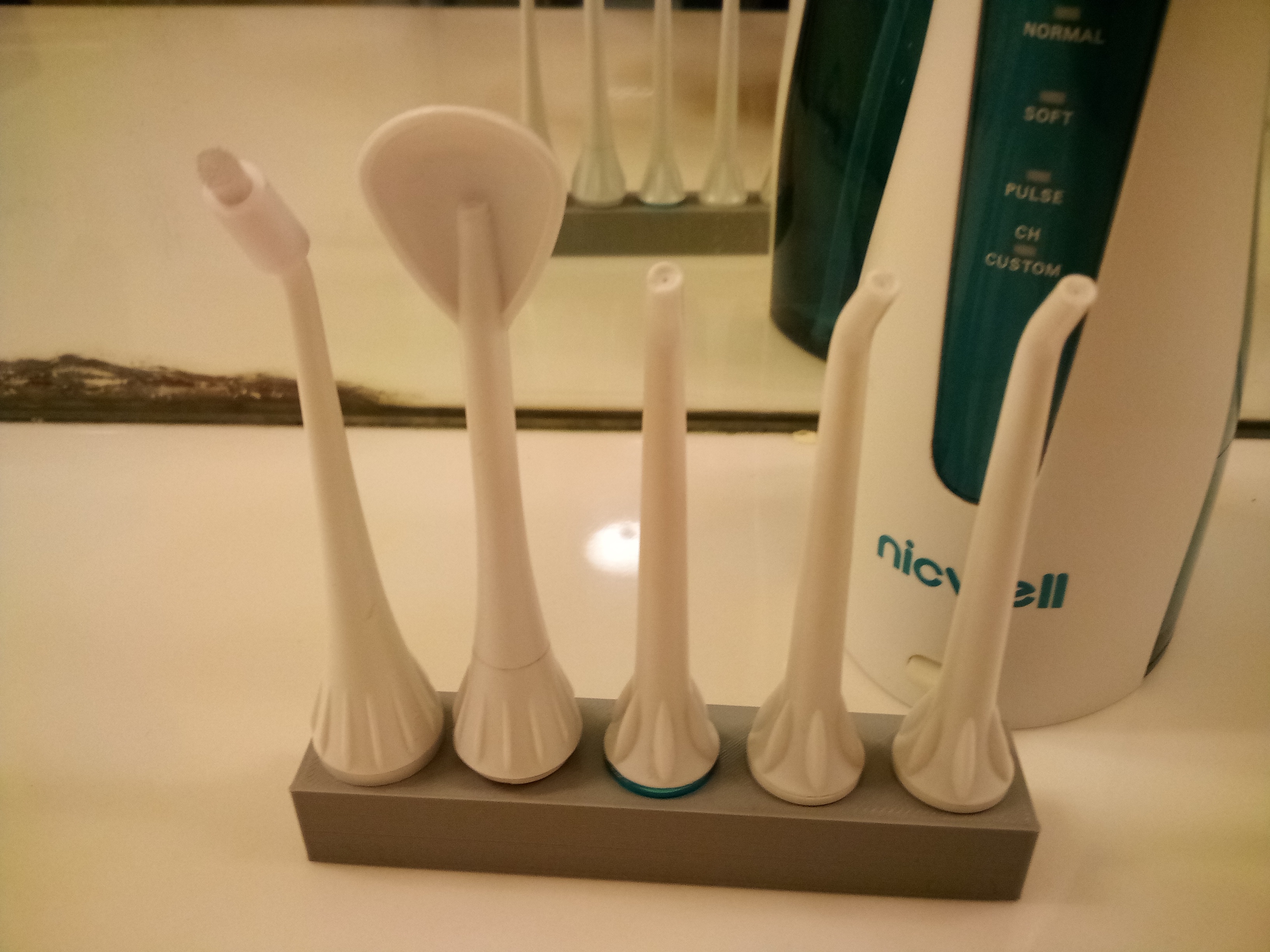 Nicwell water flosser attachment holder by JT Labs Download free STL model